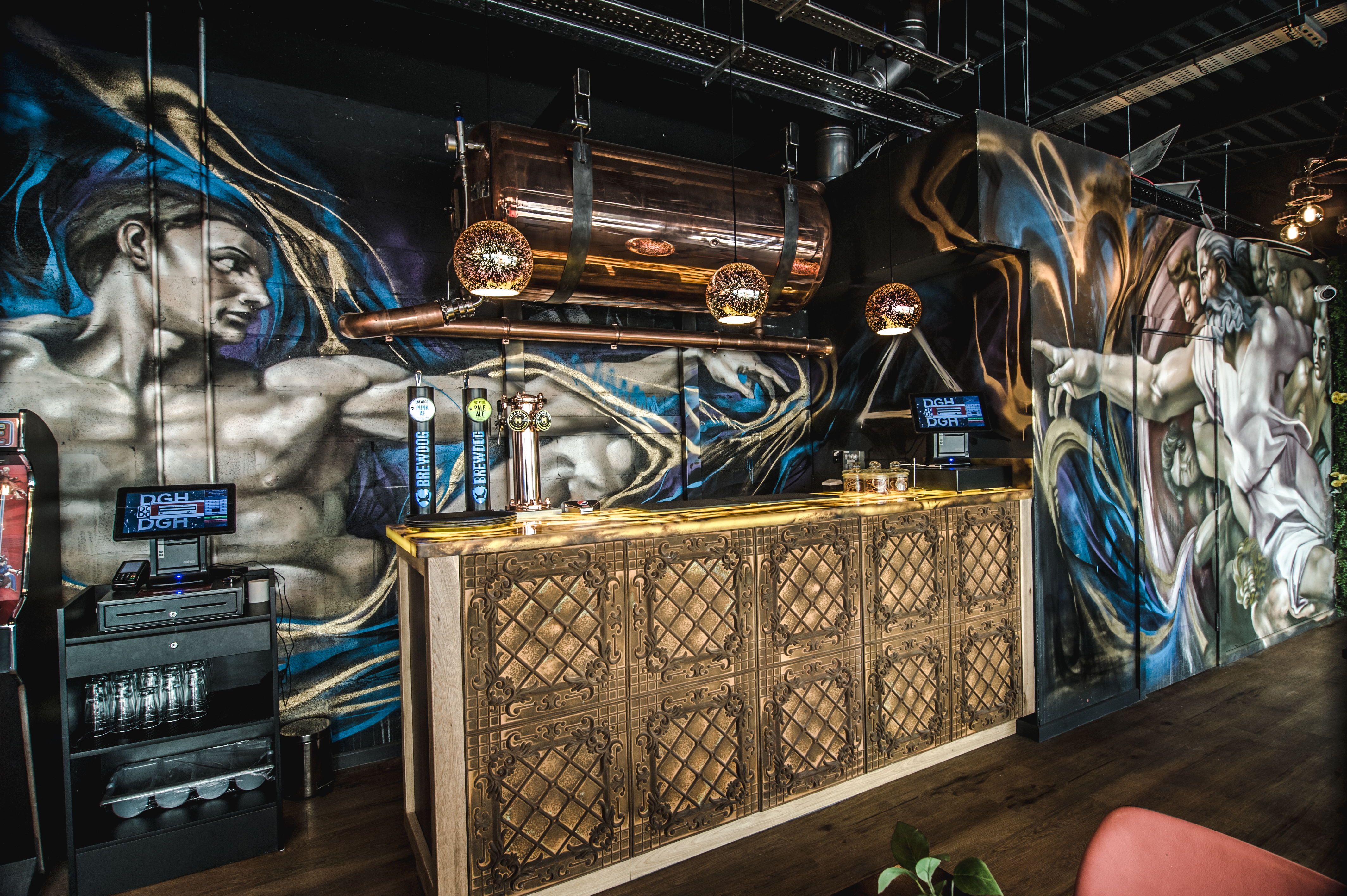 Vibrant event space with artistic bar and murals in Dough Dough Liverpool for gatherings.