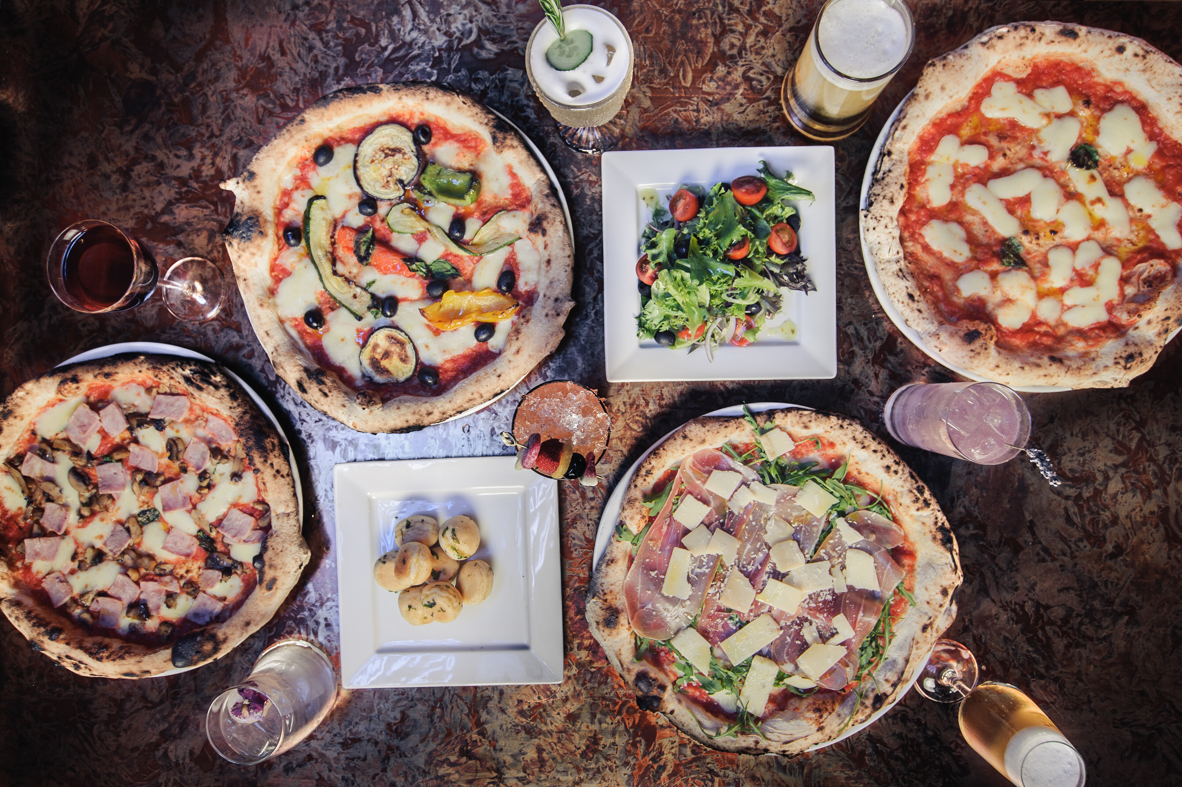 Gourmet pizzas and fresh salads for a casual networking event at Dough Dough Liverpool.