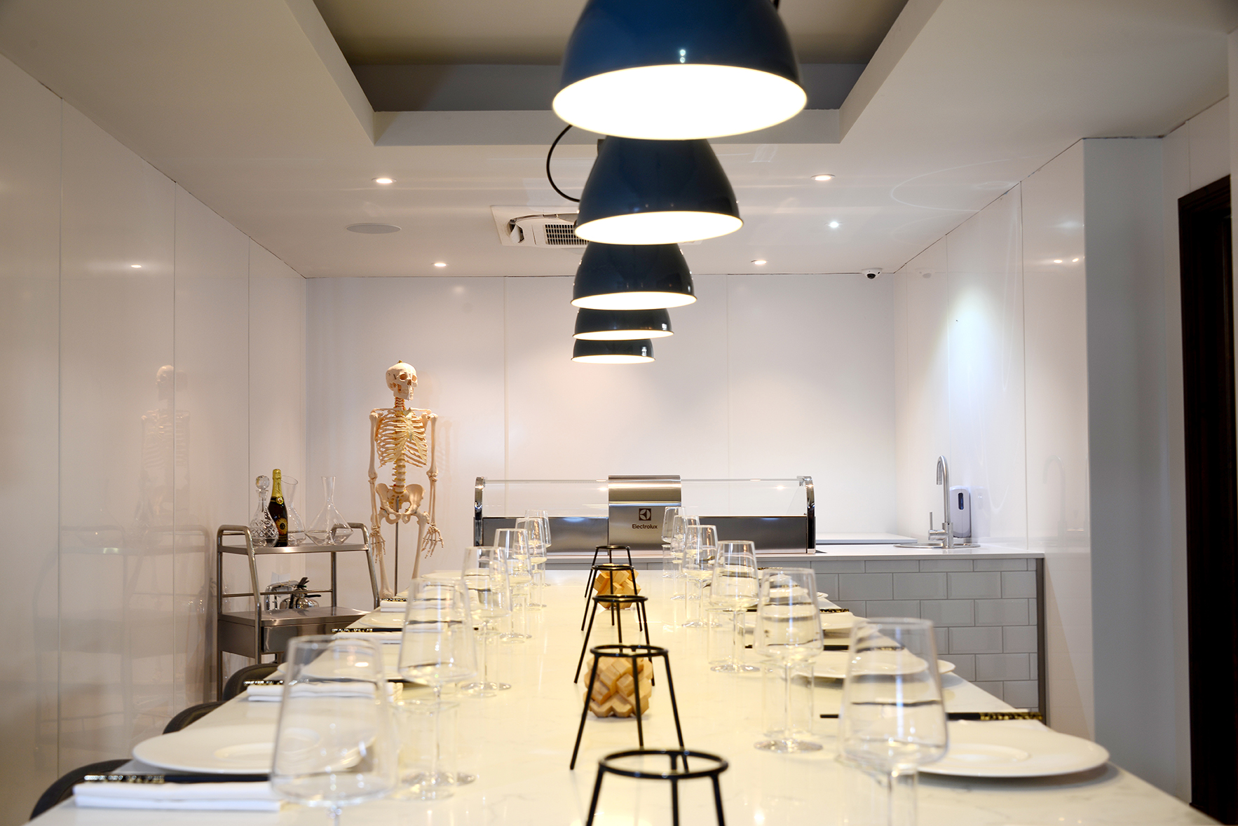 Modern dining space at Lu Ban Bar, featuring elegant table setup for themed events.