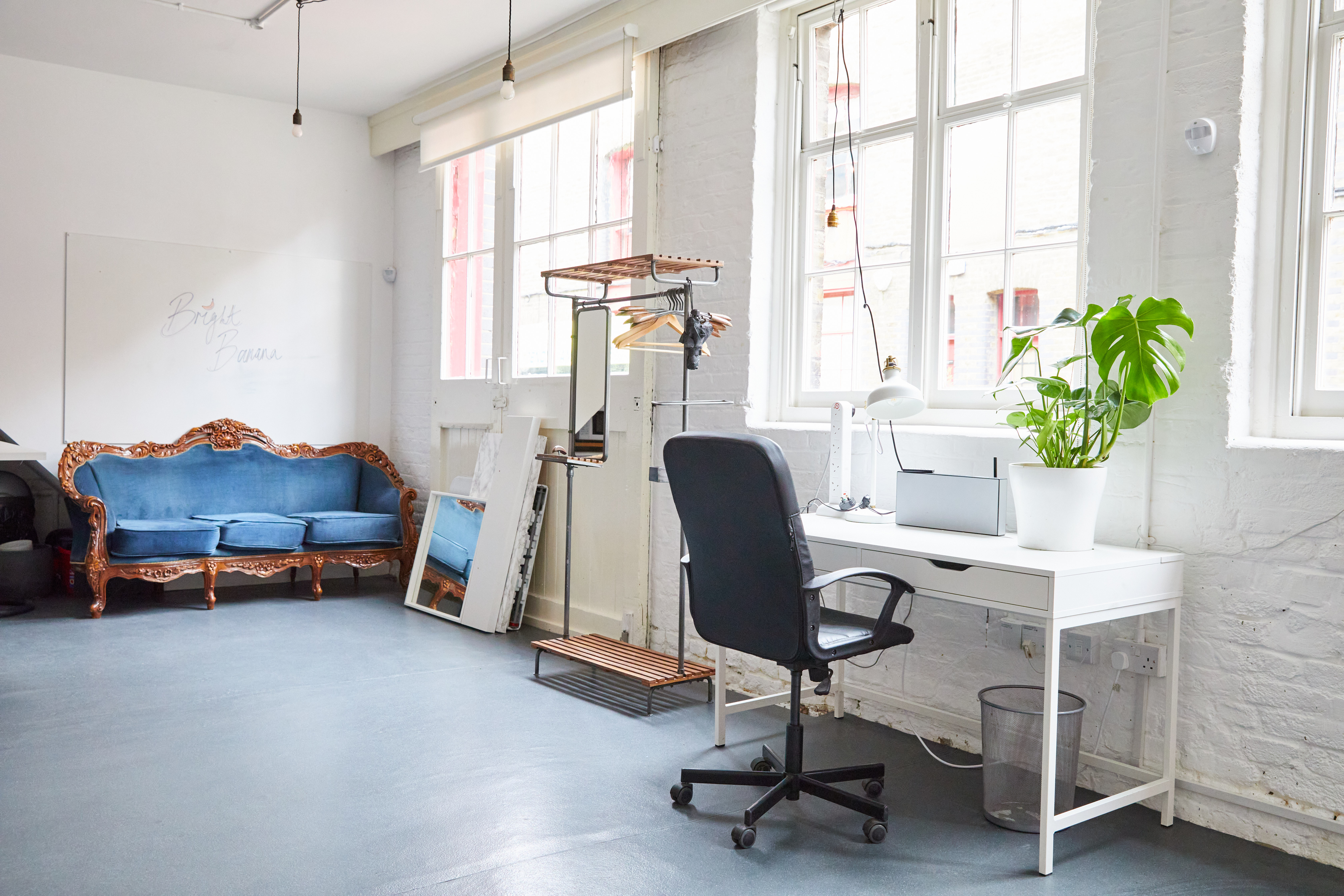 Bright minimalist workspace at Bright Banana Studios for brainstorming and meetings.