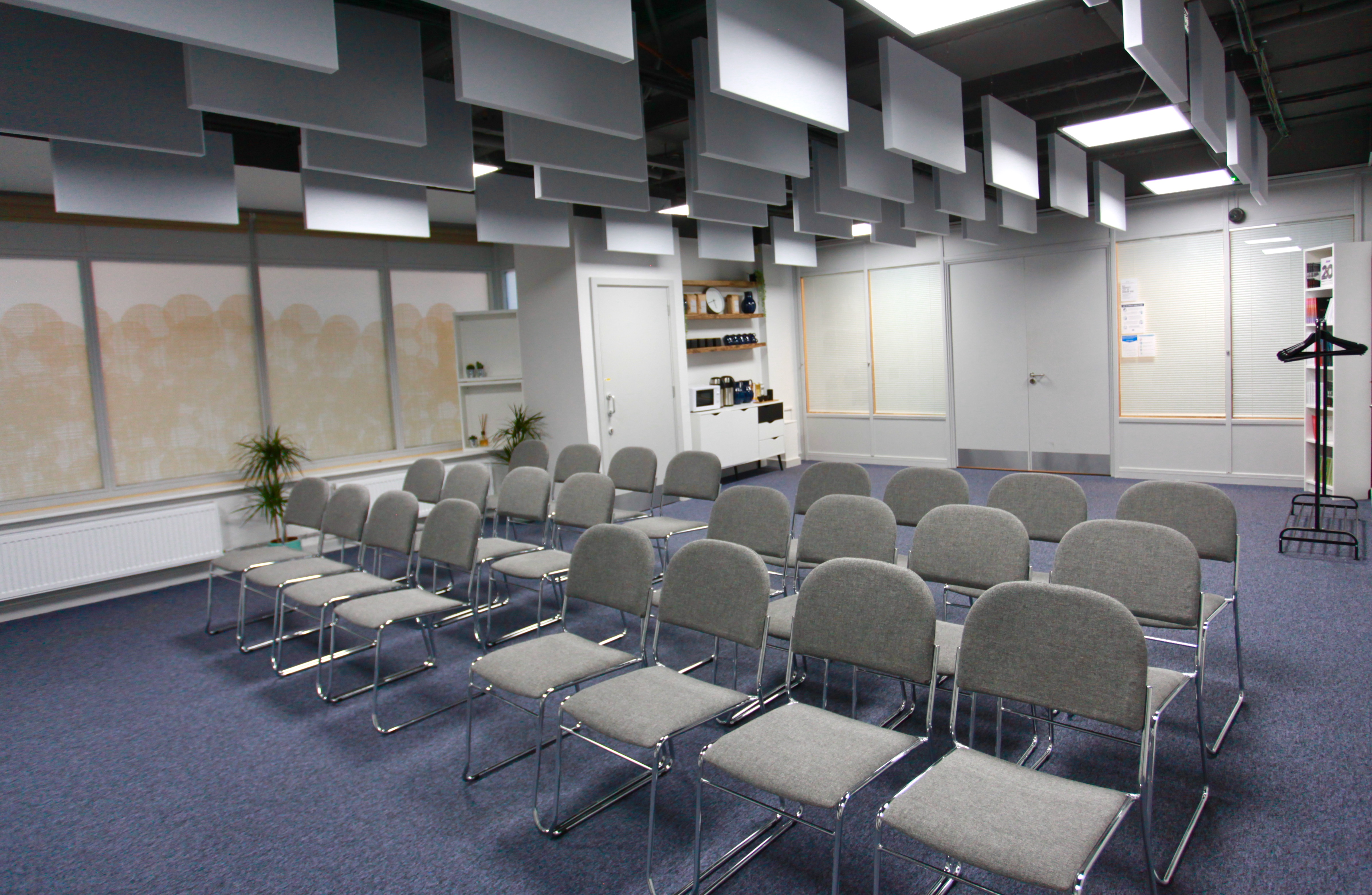 Versatile meeting space at Neal Street Espresso, ideal for workshops and presentations.