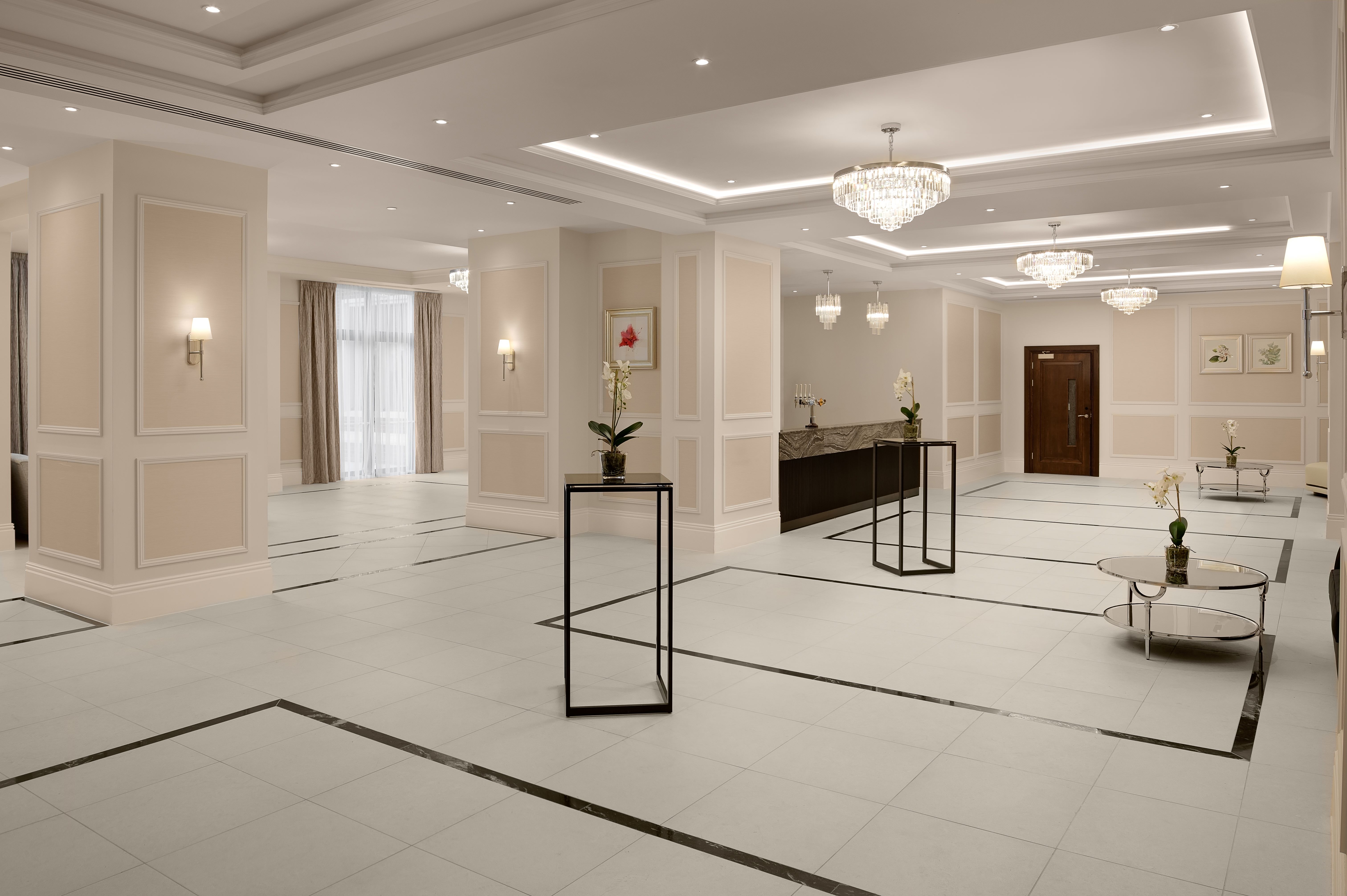 Monarch Suite at Fairmont Windsor Park: elegant event space with chandeliers for gatherings.