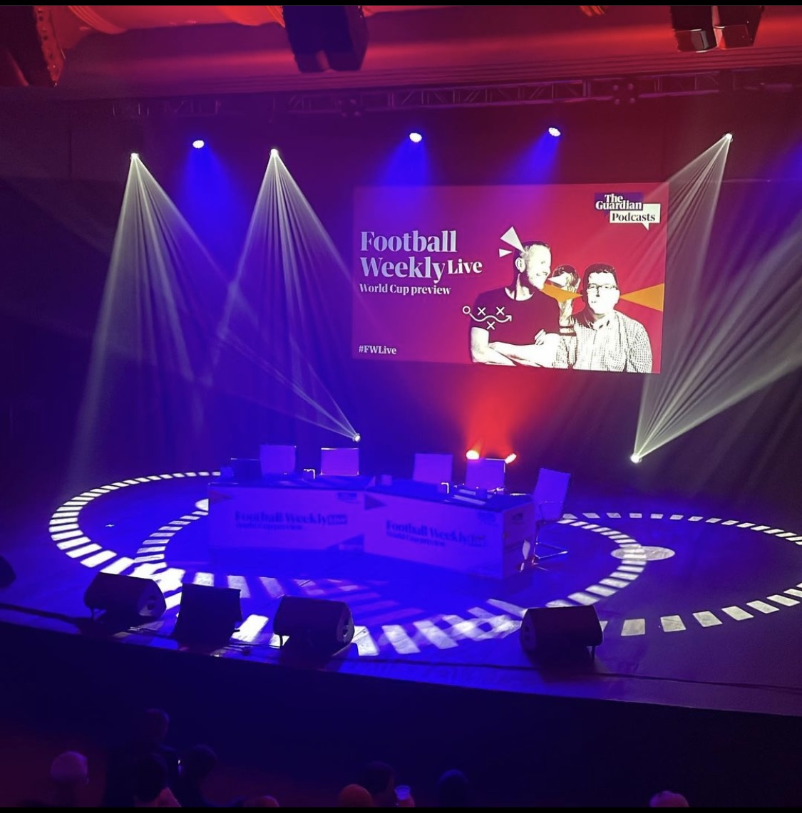 "Football Weekly Live event at EartH with vibrant lighting and interactive seating."