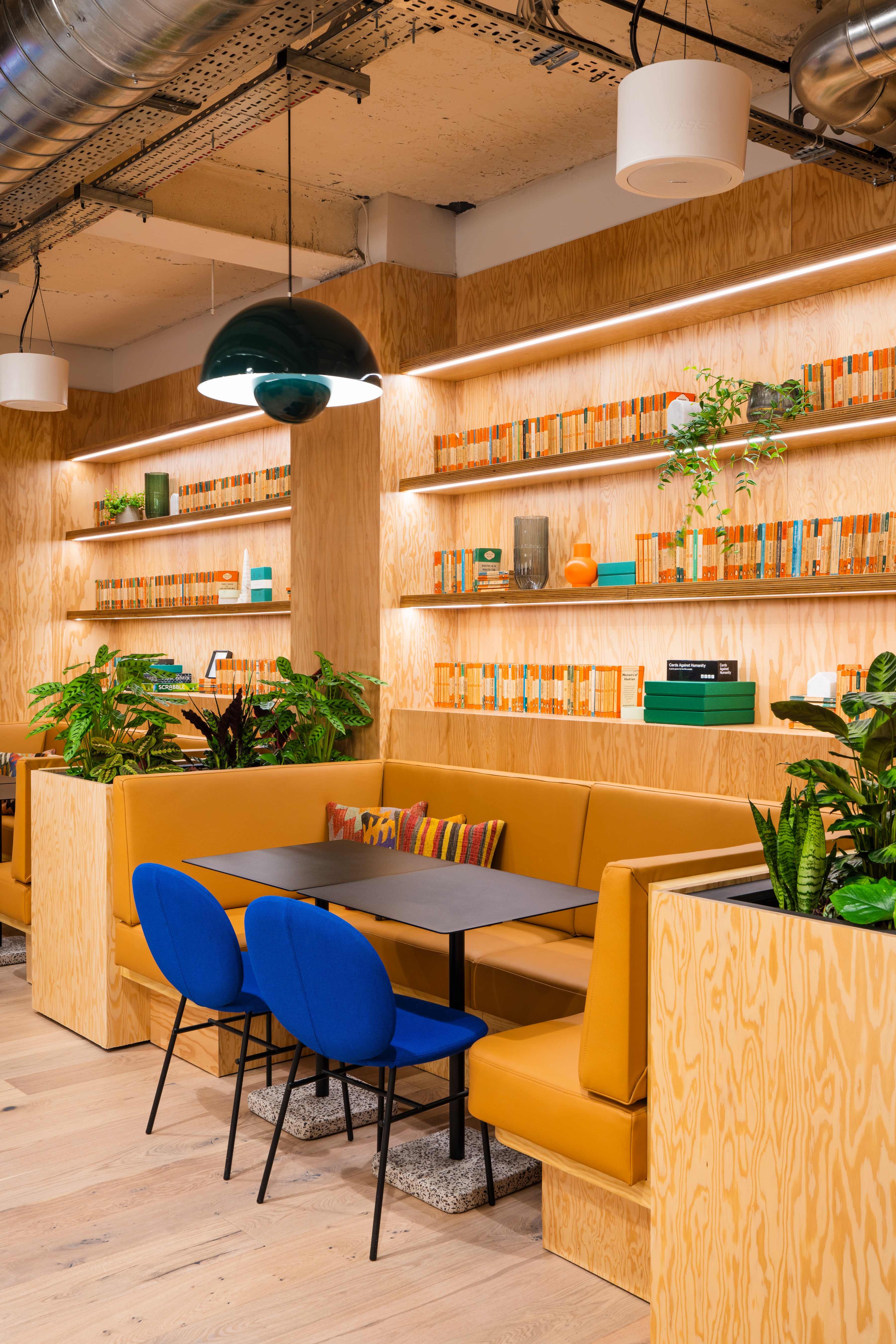 Modern meeting space with warm wood accents for creative collaboration at Aviation House.