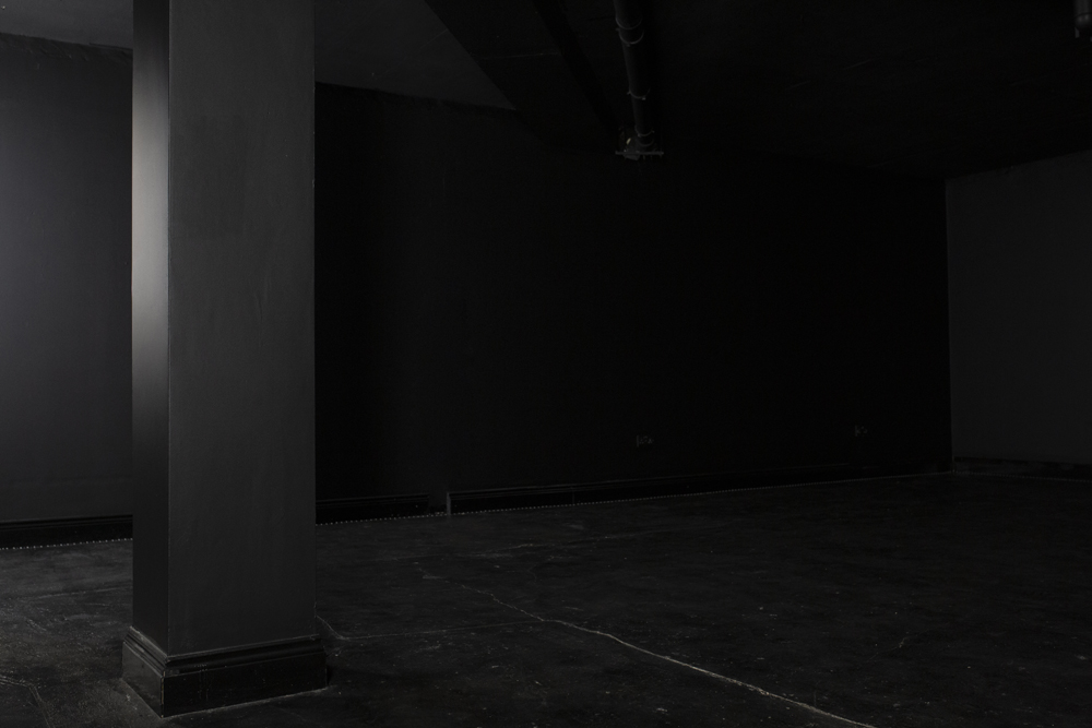 Minimalist event space in Blackout studio, perfect for immersive experiences and gatherings.