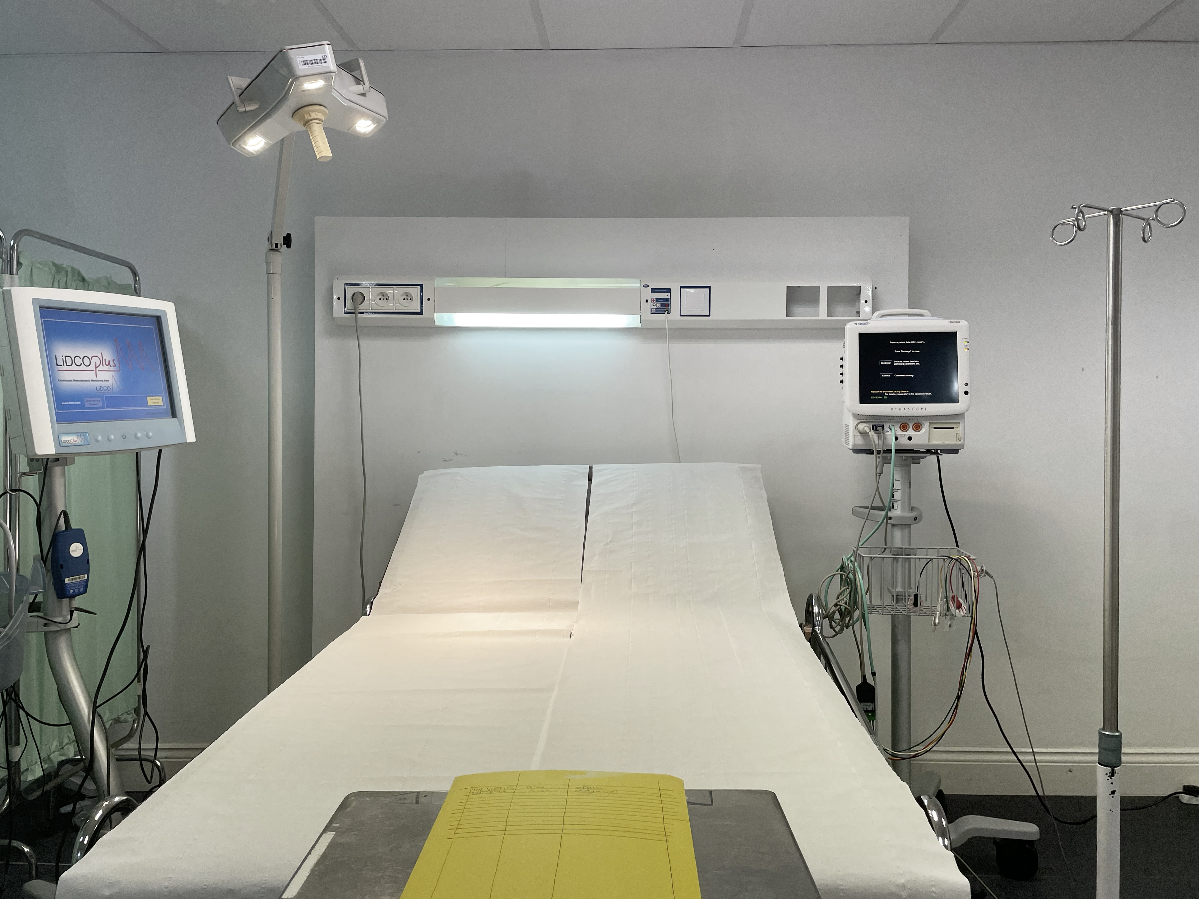 Hospital room with patient bed, ideal for health conferences and workshops.