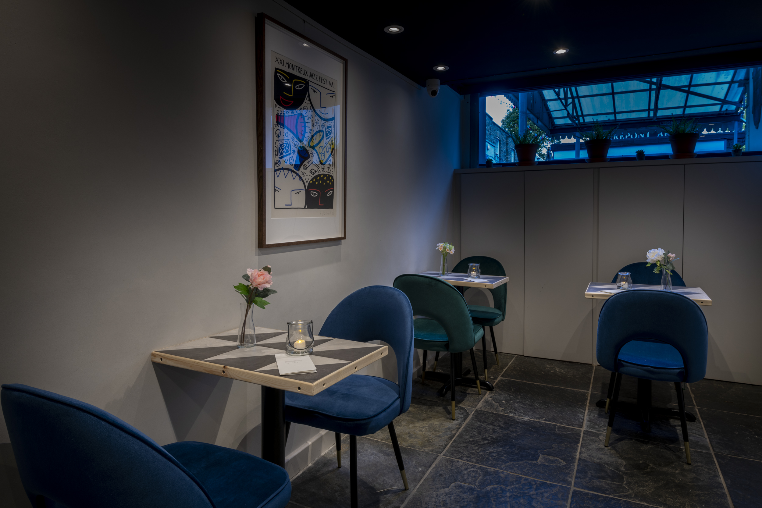 Stylish Frequency Cocktail Bar meeting space with plush seating for gatherings.