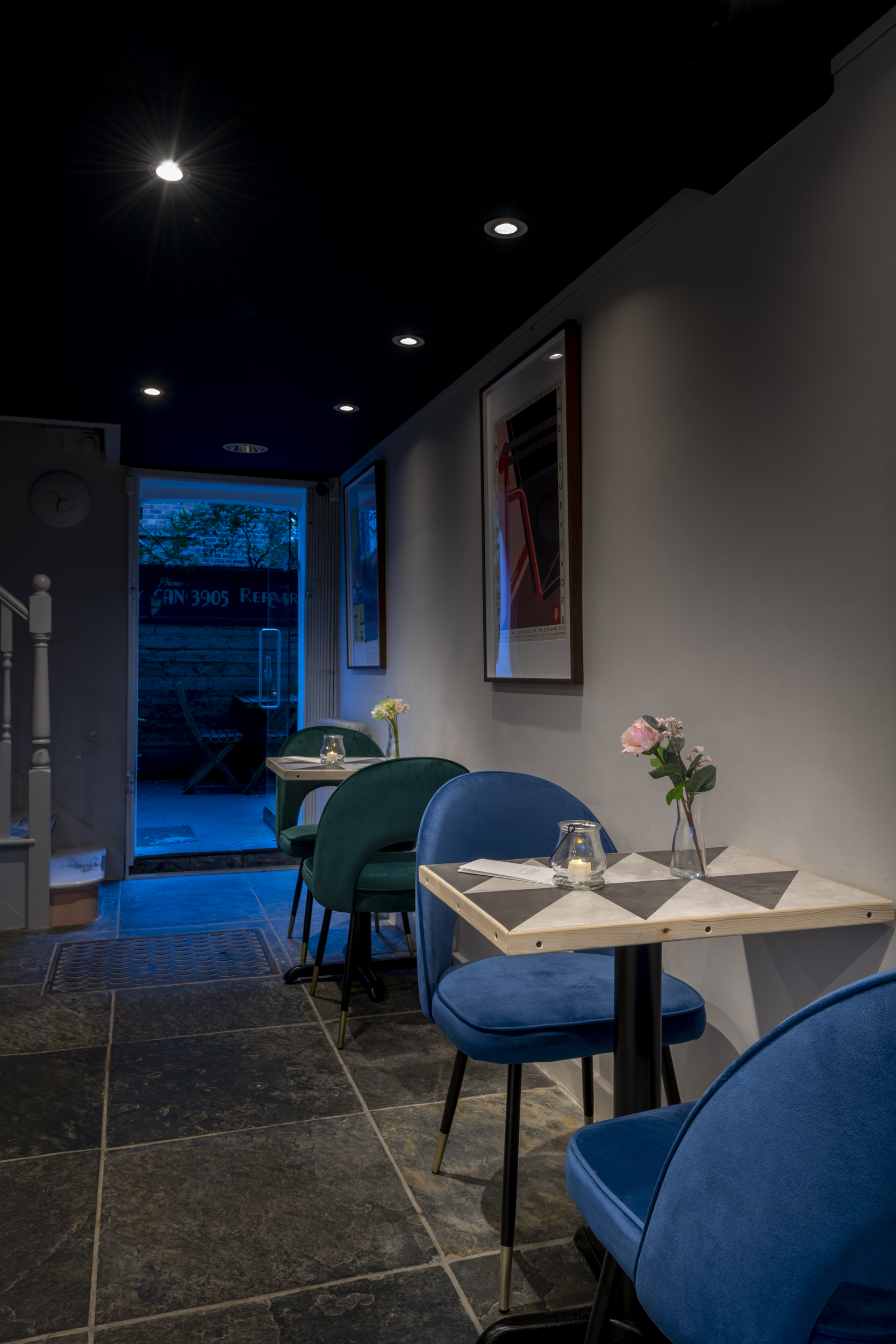 Cozy Frequency Cocktail Bar with soft lighting, perfect for networking events and gatherings.