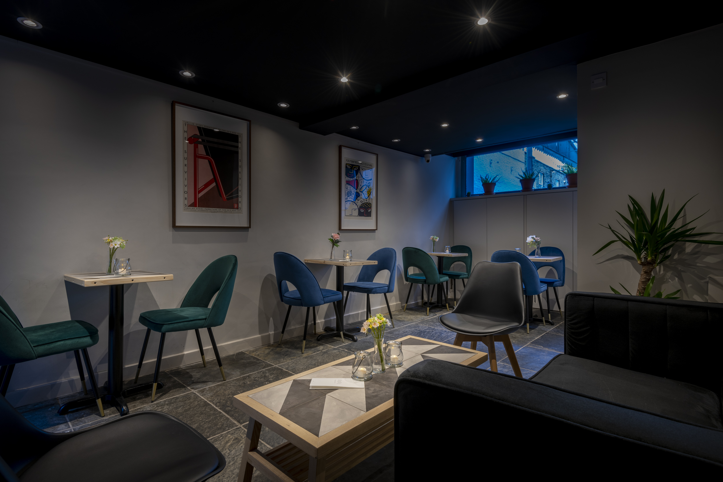 Stylish Frequency Cocktail Bar meeting space with soft lighting for networking events.