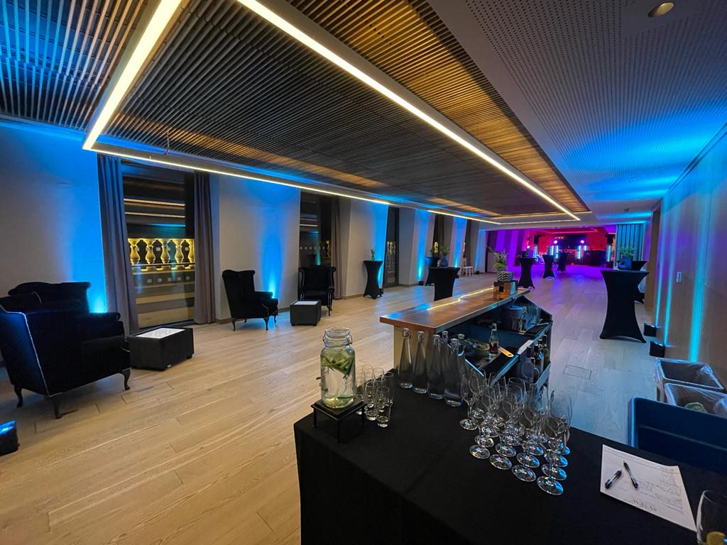 The View reception: blue/pink lights, modern bar, event venue