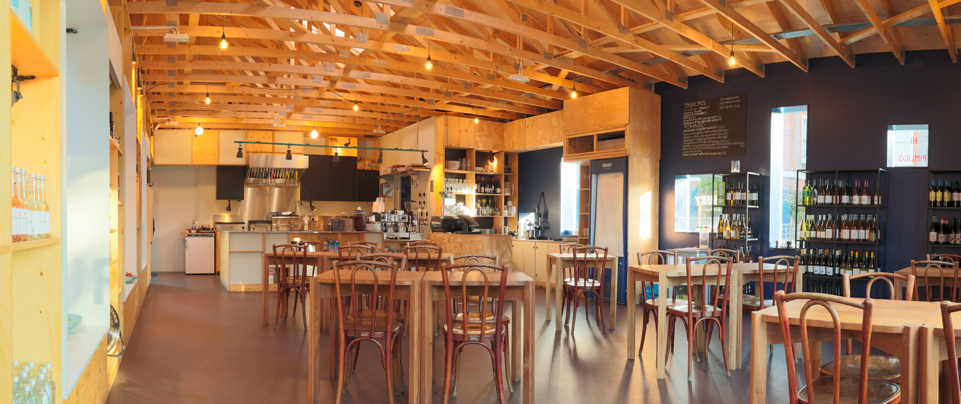 Versatile wedding venue with wooden beams, ideal for events and gatherings in Ebury.