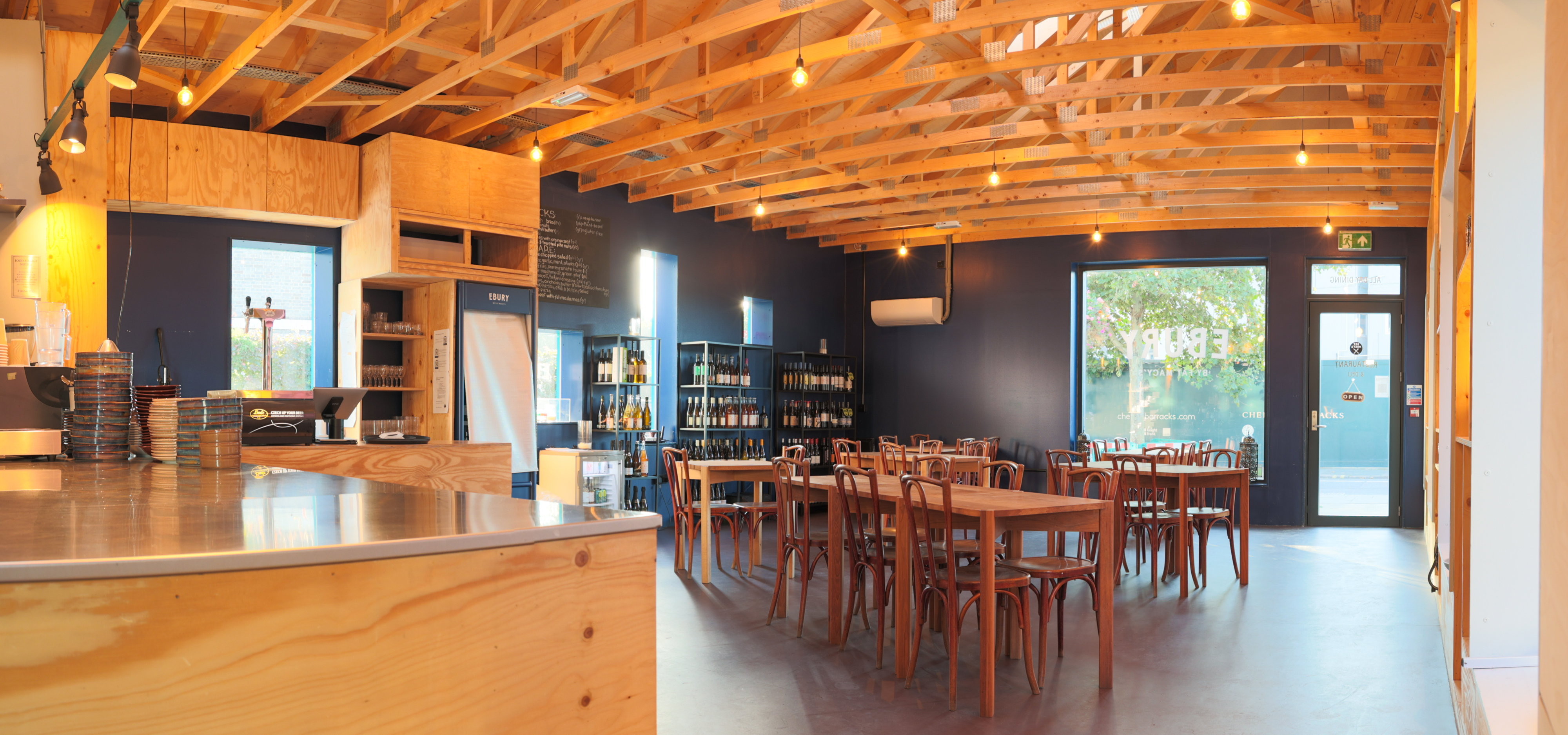 Versatile wedding venue with wooden beams and natural light in Ebury by Fat Macy's.