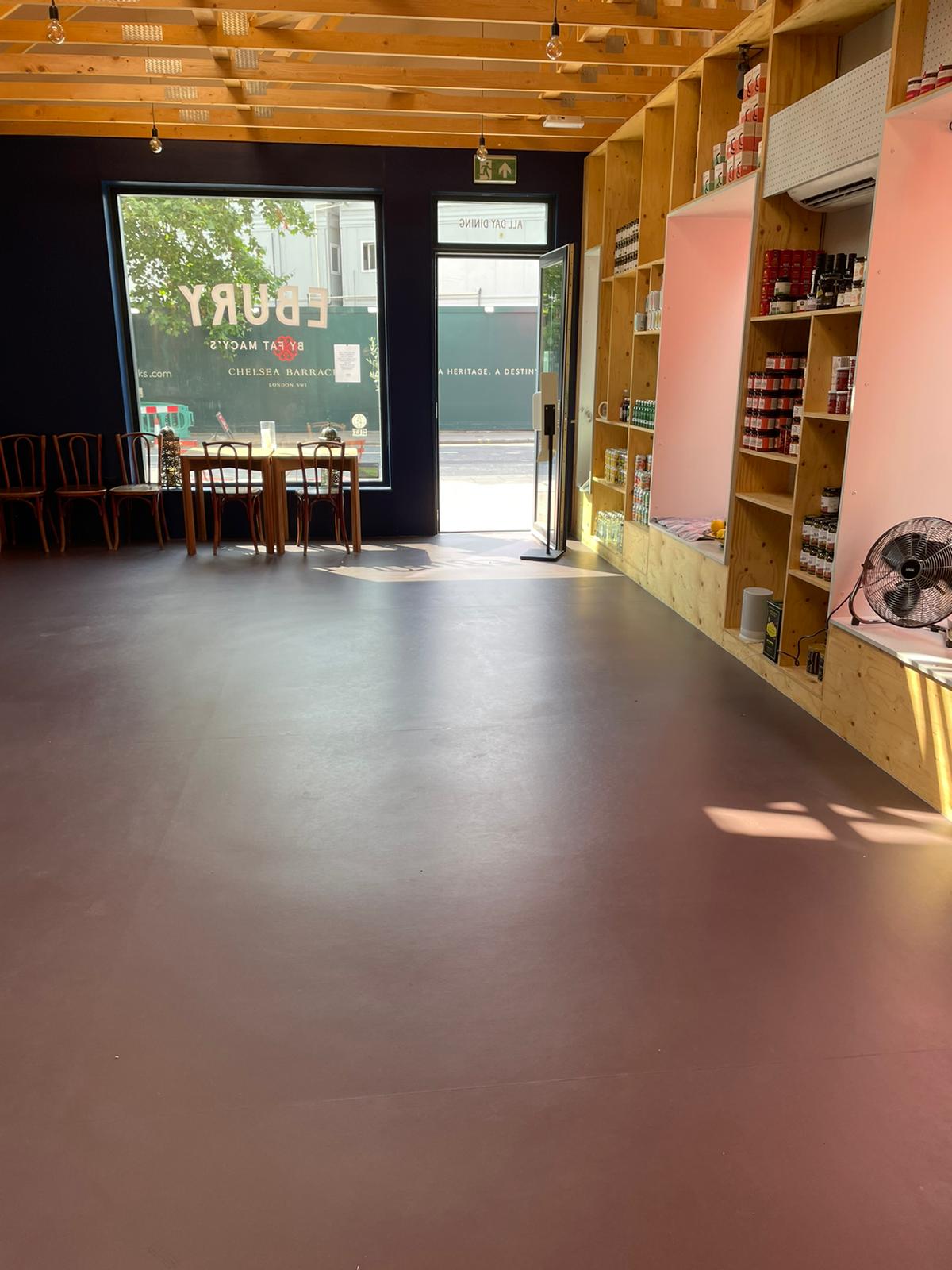 Versatile wedding venue with natural light and minimalist design for events and workshops.