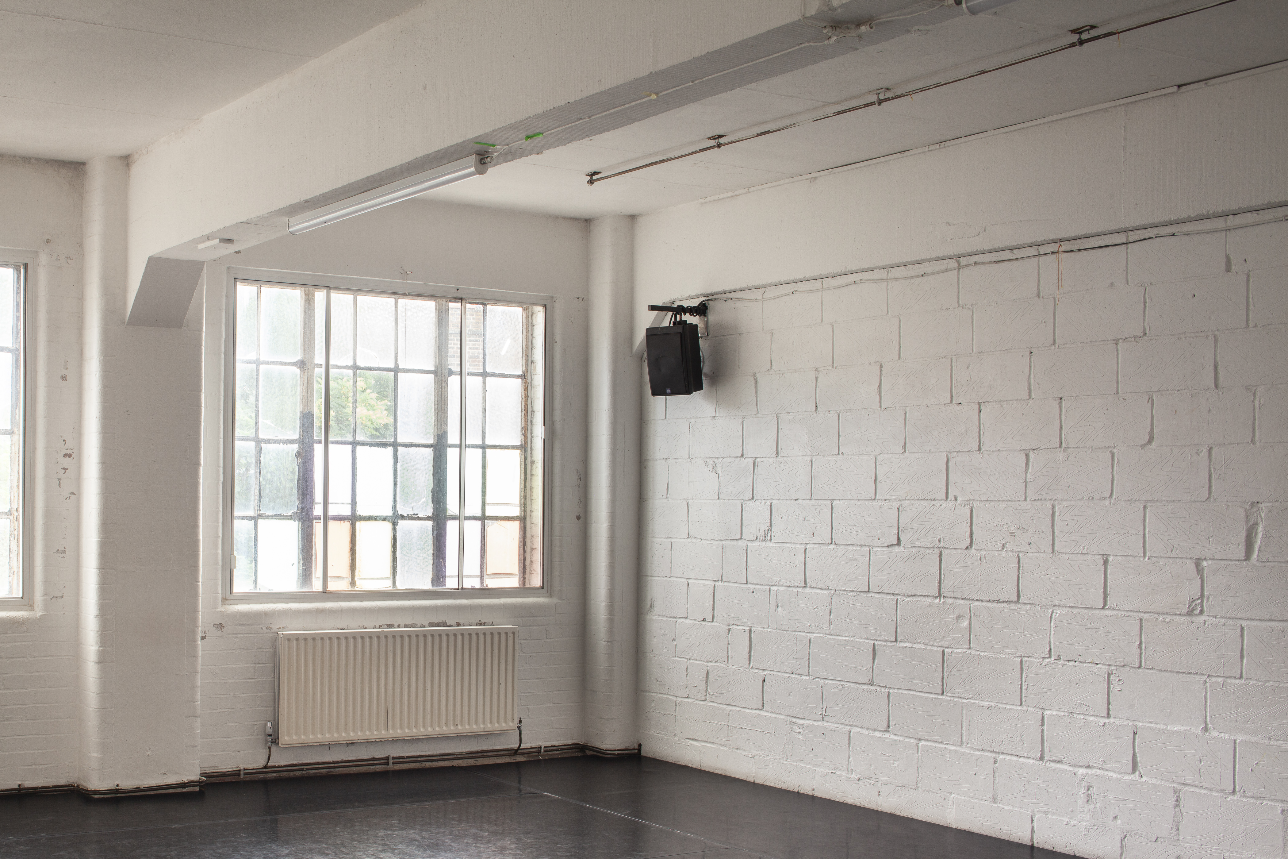 Versatile event space with natural light for workshops and gatherings at Chisenhale Dance Space.