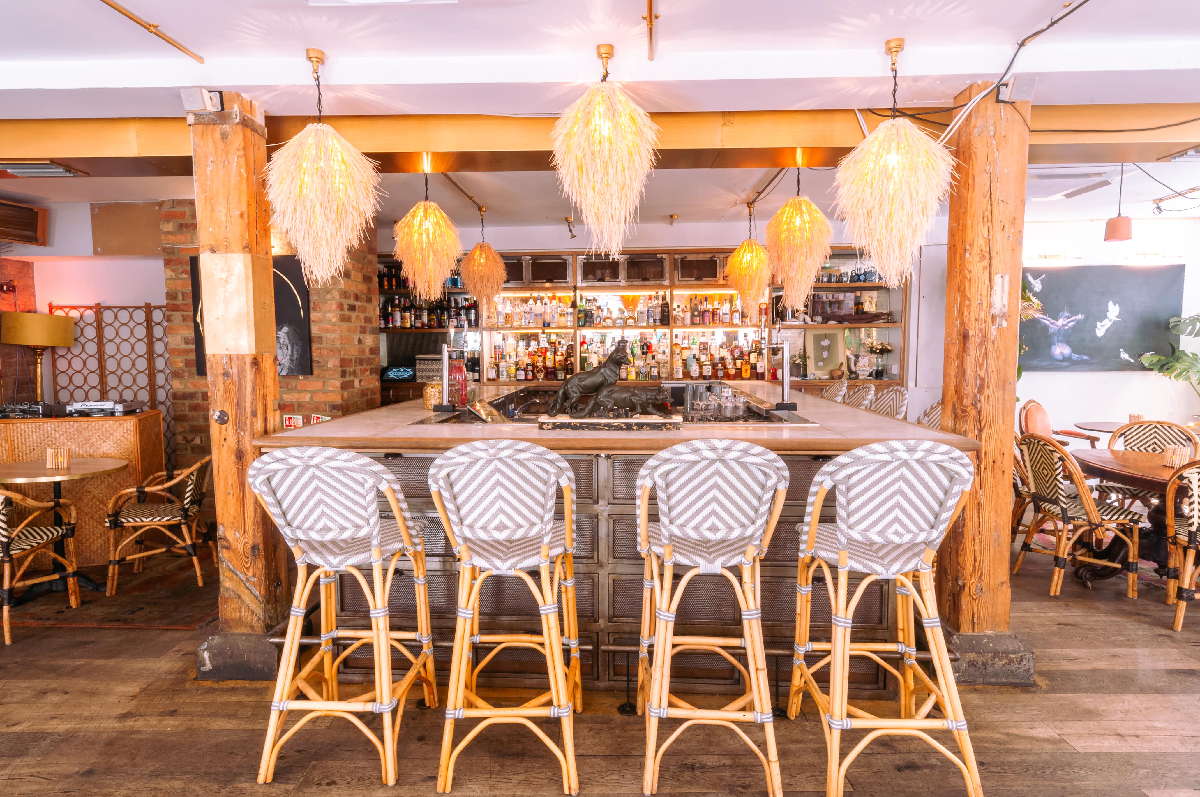 Mala Madre Private Events Space bar with unique lighting for networking and gatherings.