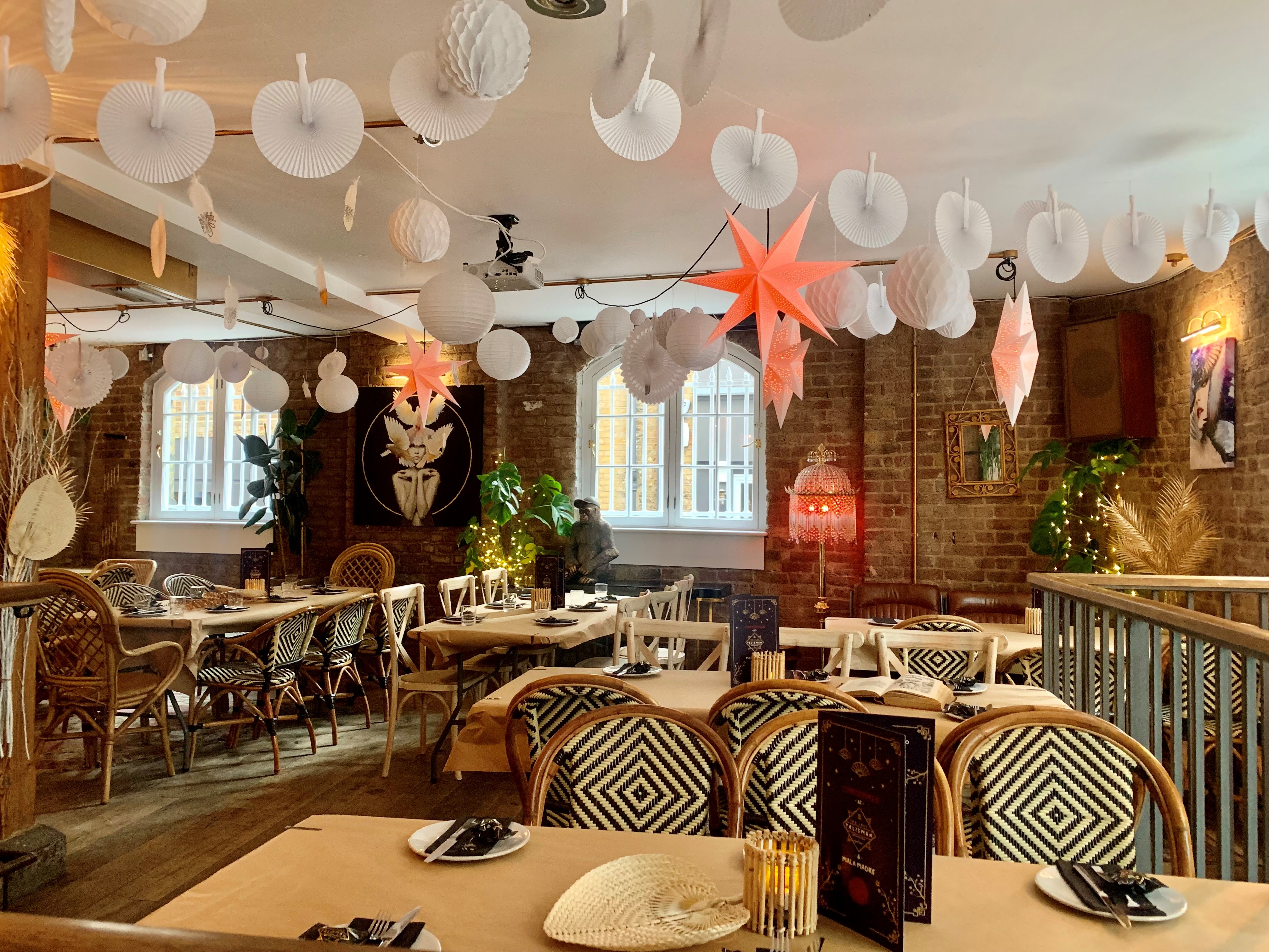 Mala Madre event space with rustic brick walls, perfect for intimate gatherings and workshops.