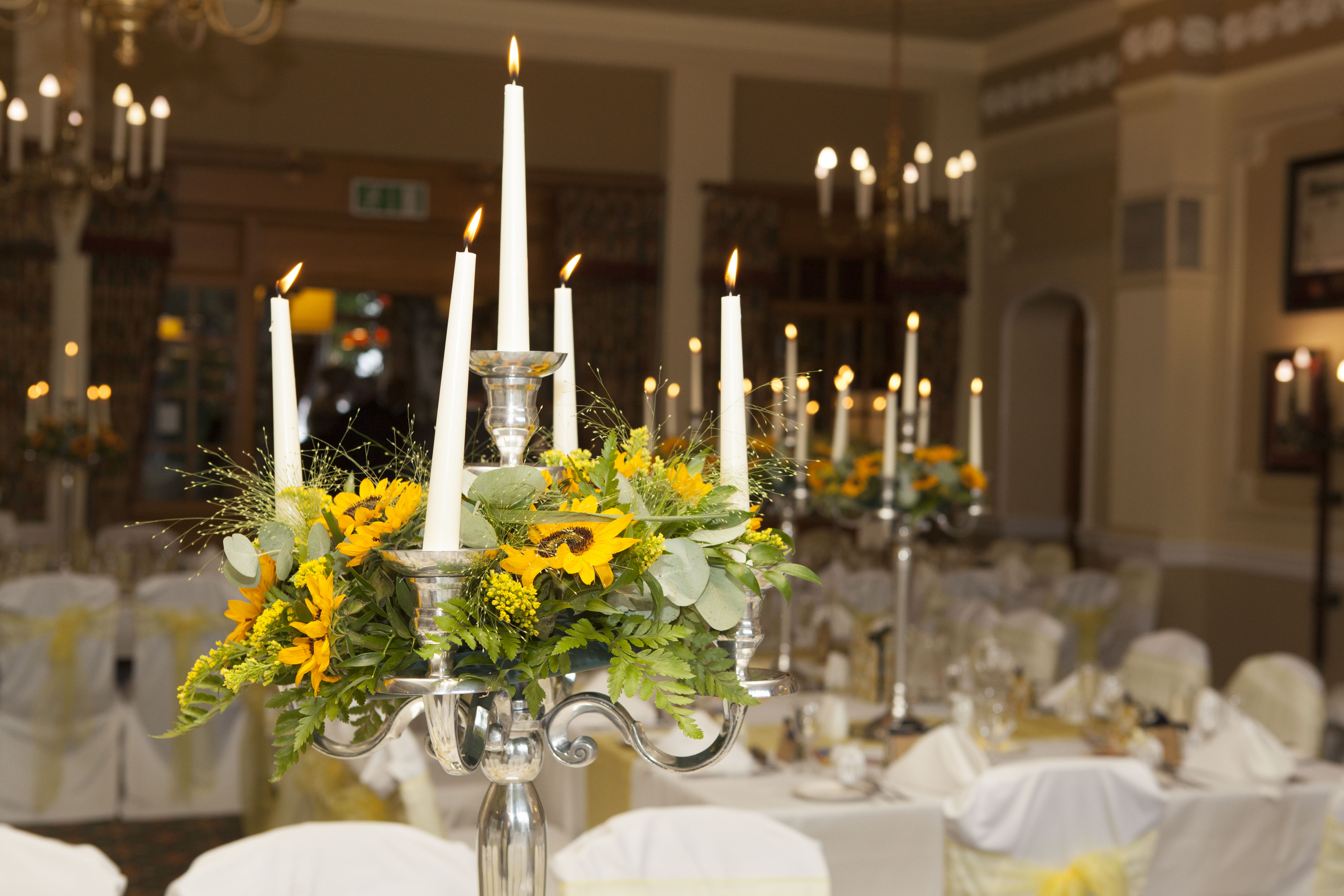 Elegant banquet setup with candelabras for weddings and corporate dinners at Best Western.