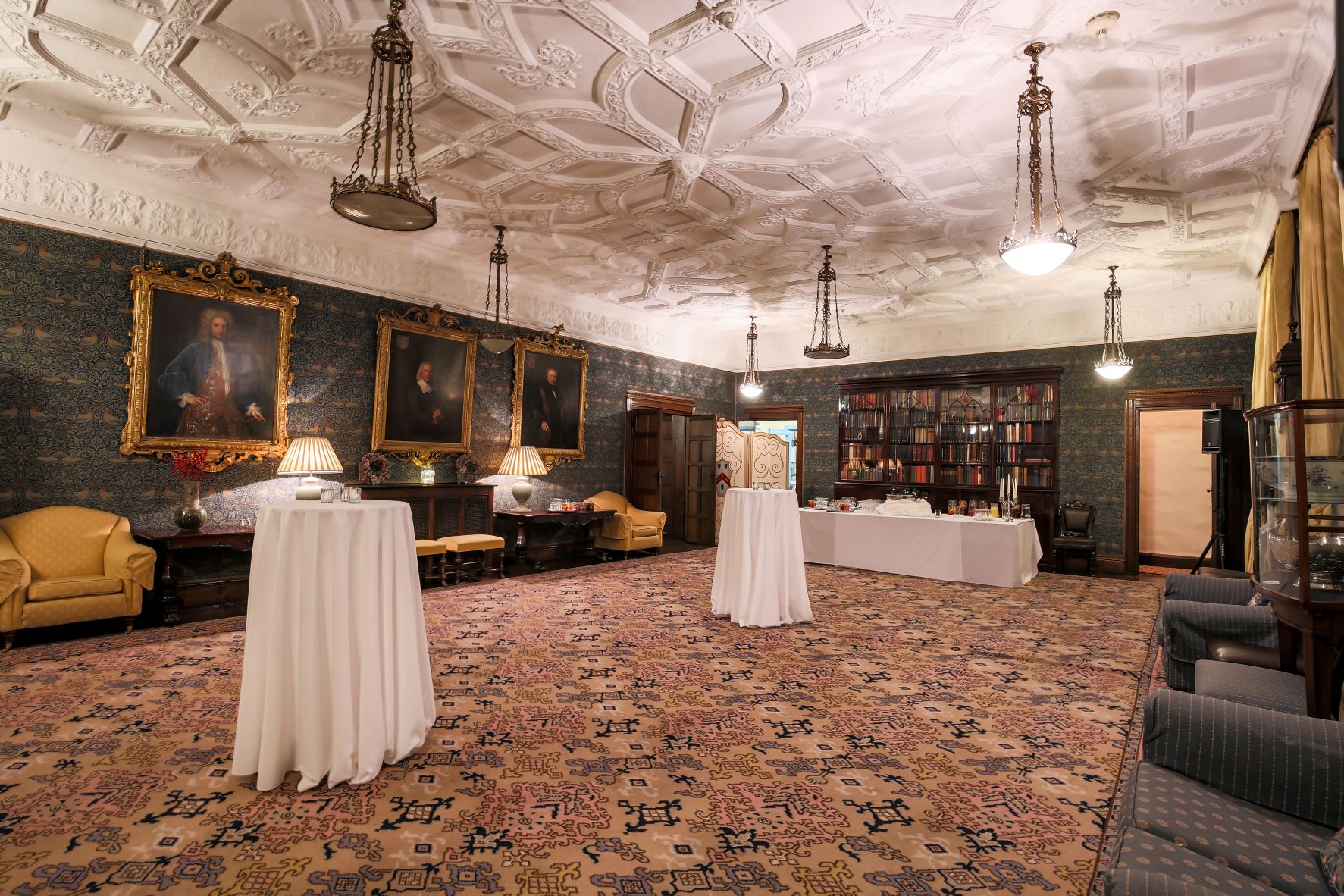 Christmas event at Ironmongers' Hall with elegant decor and warm lighting.