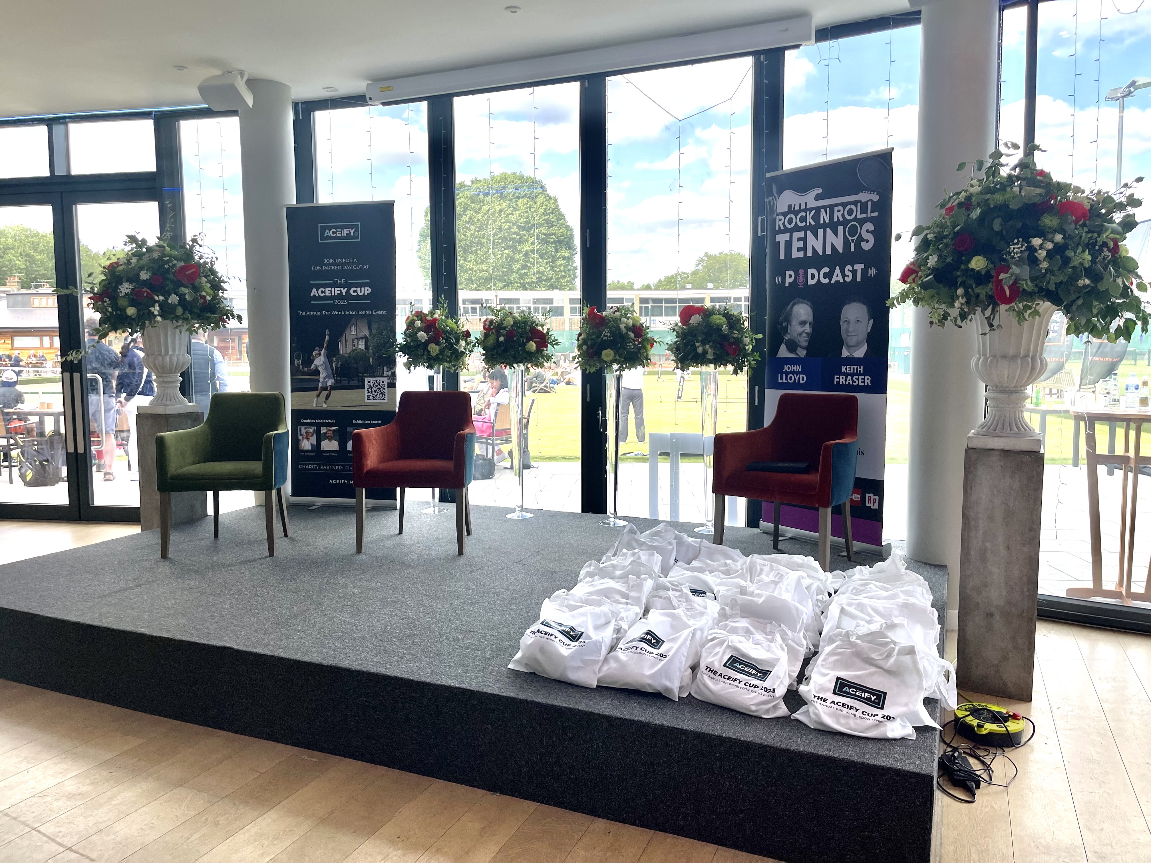 The Oval Room at Parsons Green Club, featuring stylish chairs for panel discussions.
