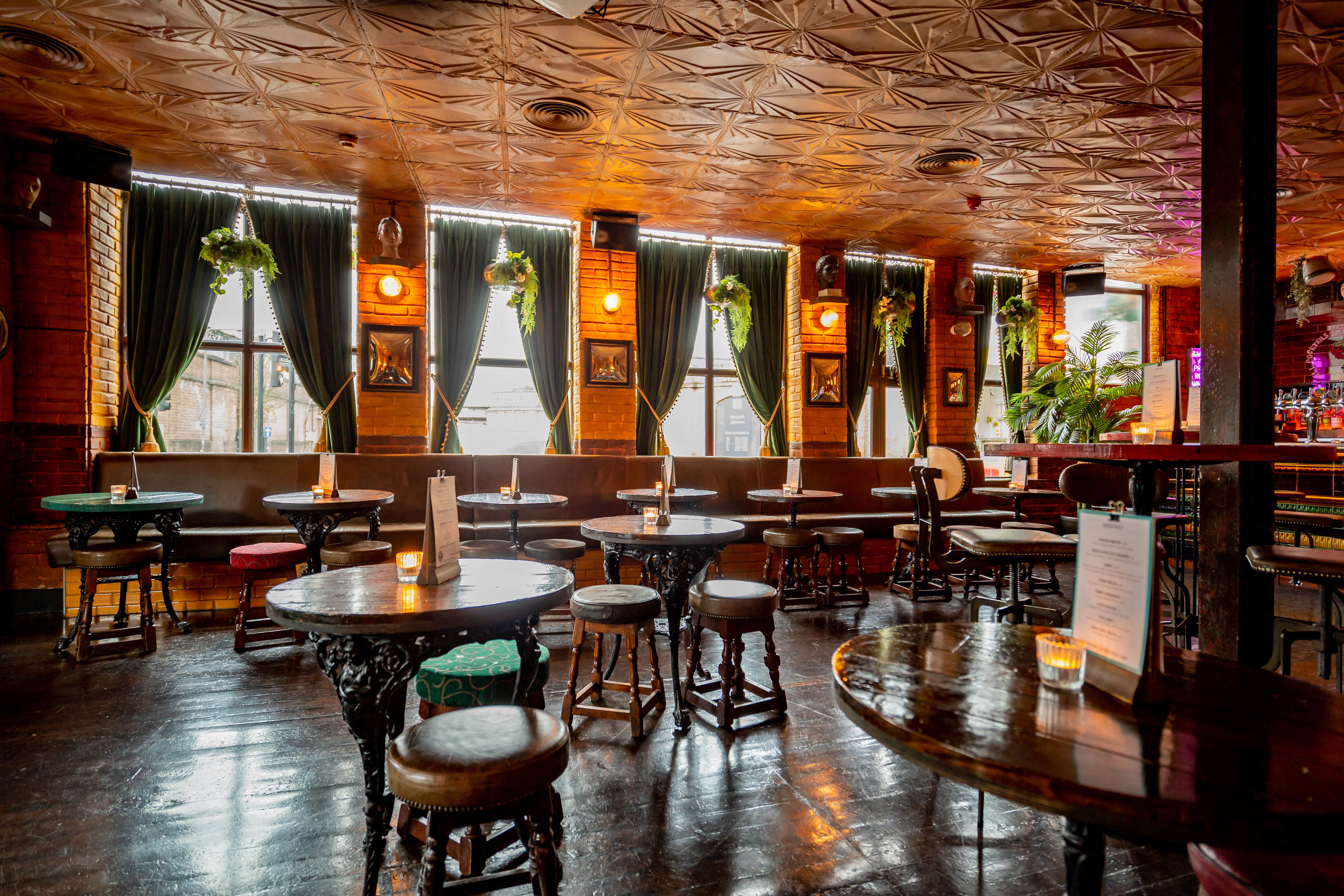 Stylish Camden Assembly venue with cozy seating, perfect for gatherings and networking events.
