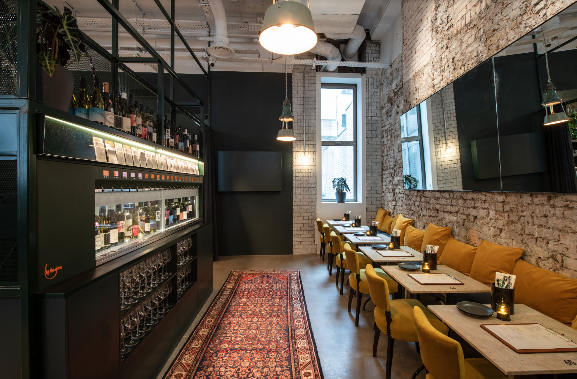 Stylish event space with sleek bar, ideal for networking and gatherings at VAGABOND MONUMENT.