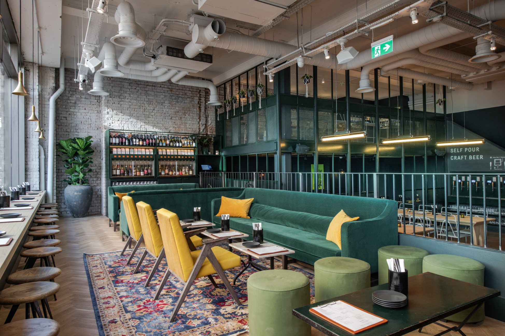 Modern lounge with vibrant seating, ideal for meetings and events.