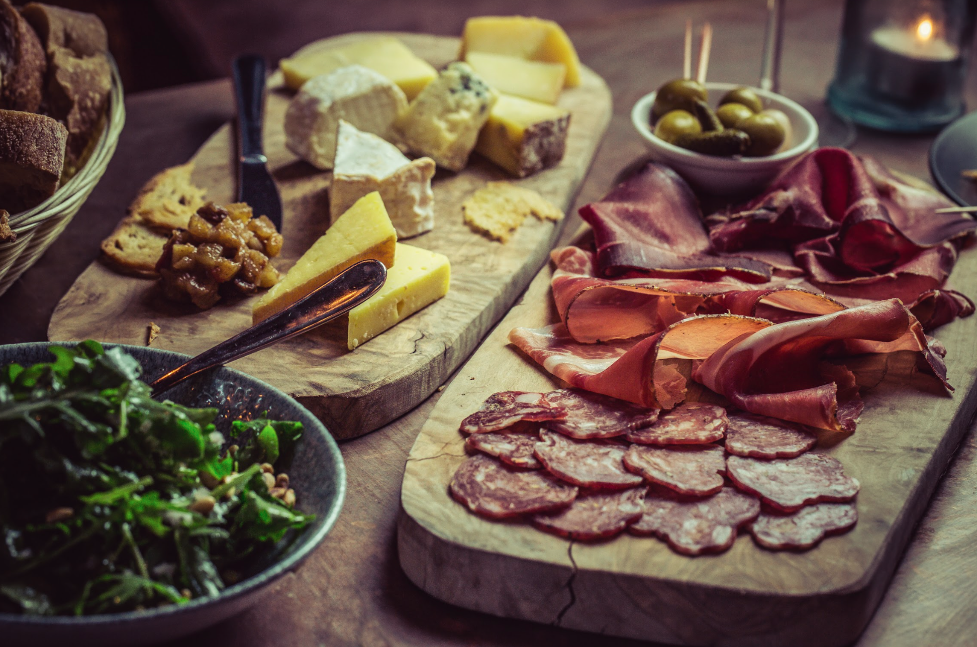 Charcuterie board in The Lounge at VAGABOND MONUMENT for networking events.