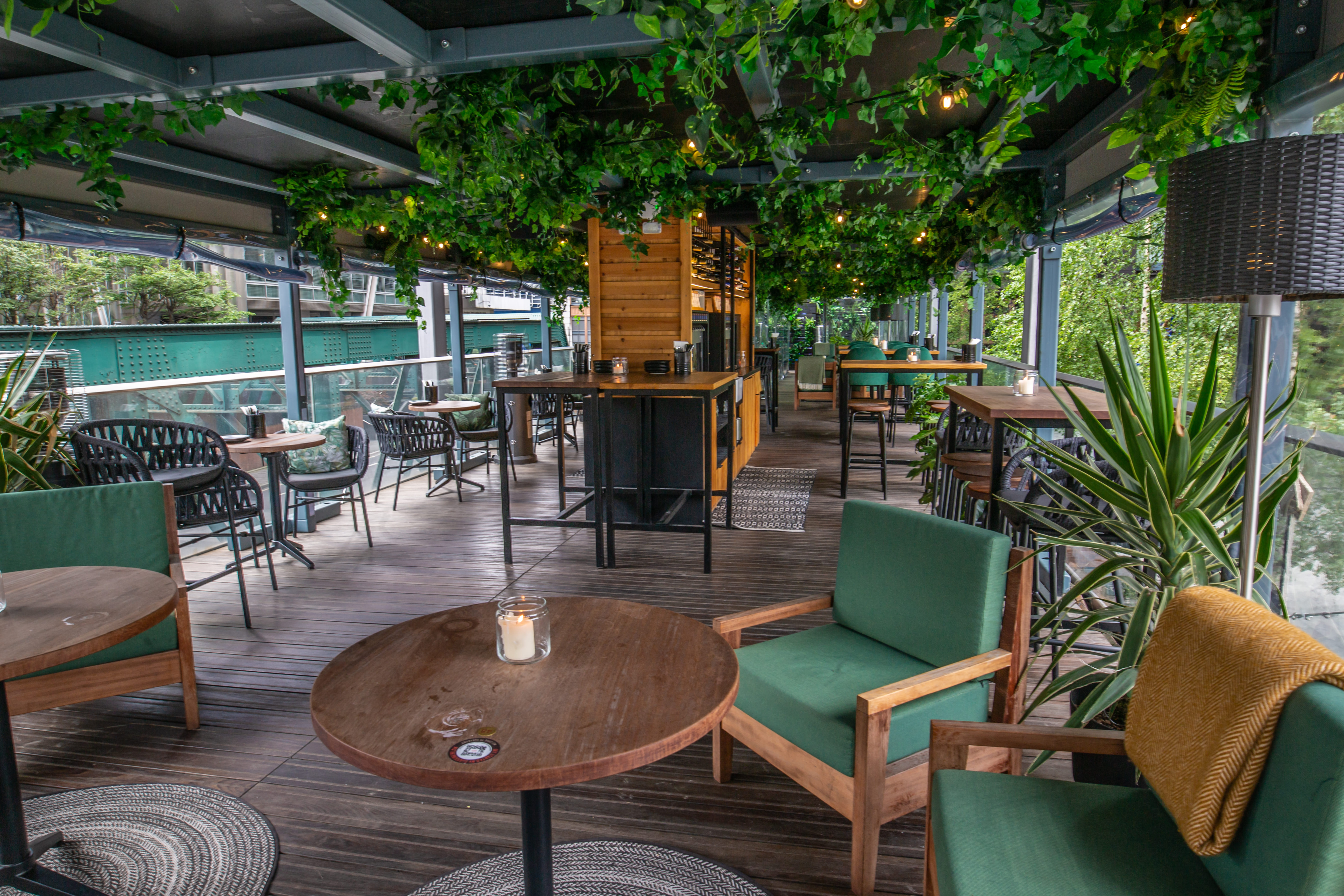 Stylish Roof Terrace at Vagabond Shoreditch, perfect for events with lush greenery.
