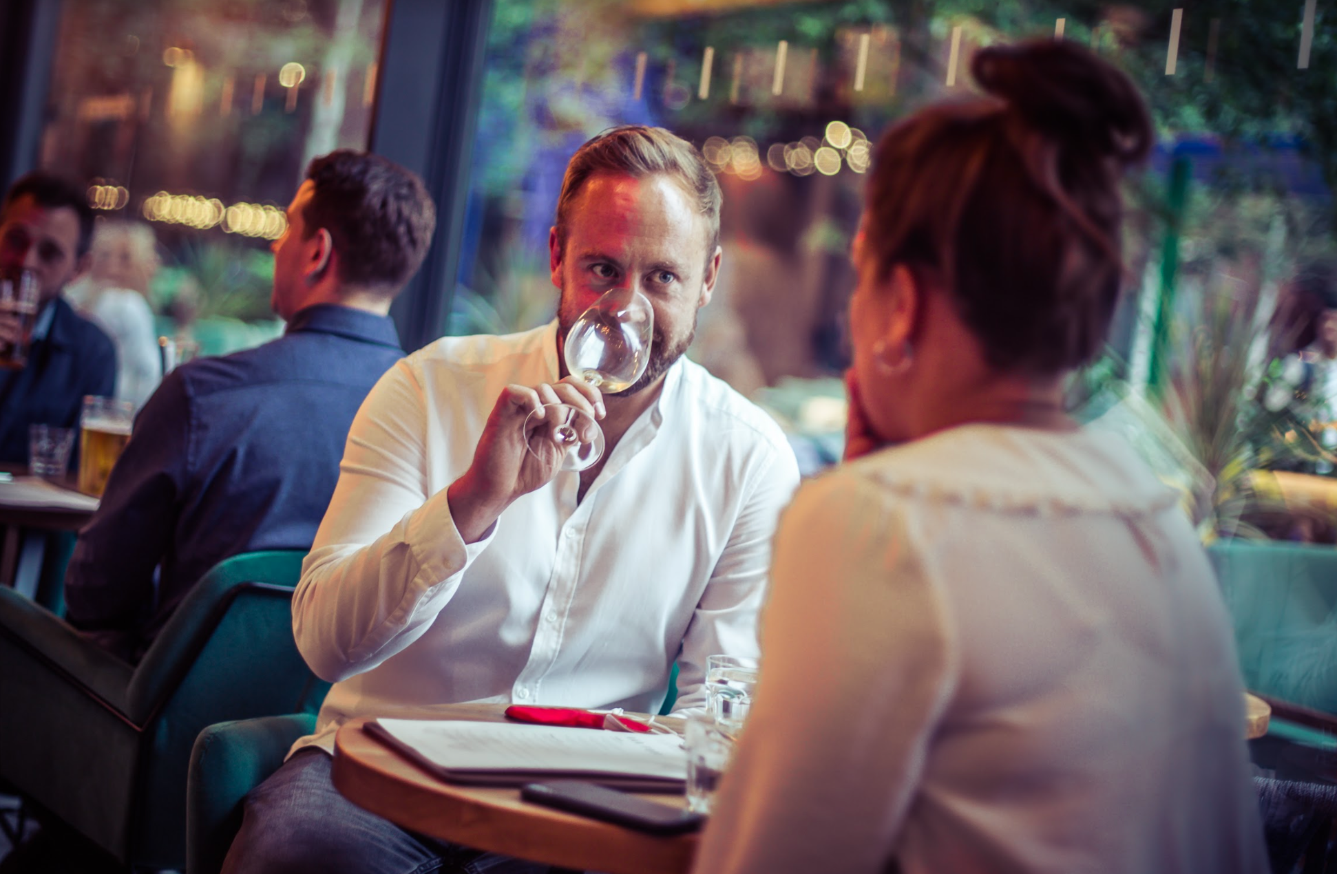 Dynamic networking event at Vagabond Shoreditch with stylish decor and intimate atmosphere.