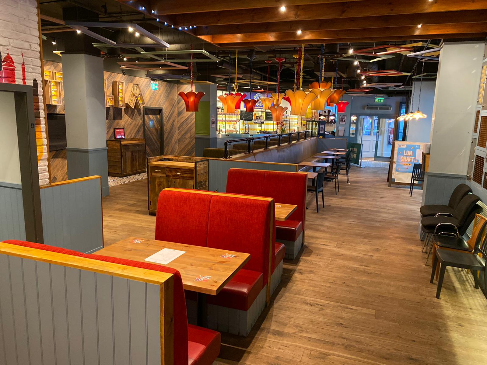 Modern dining space at LDN Craft bar, perfect for casual meetings and events.