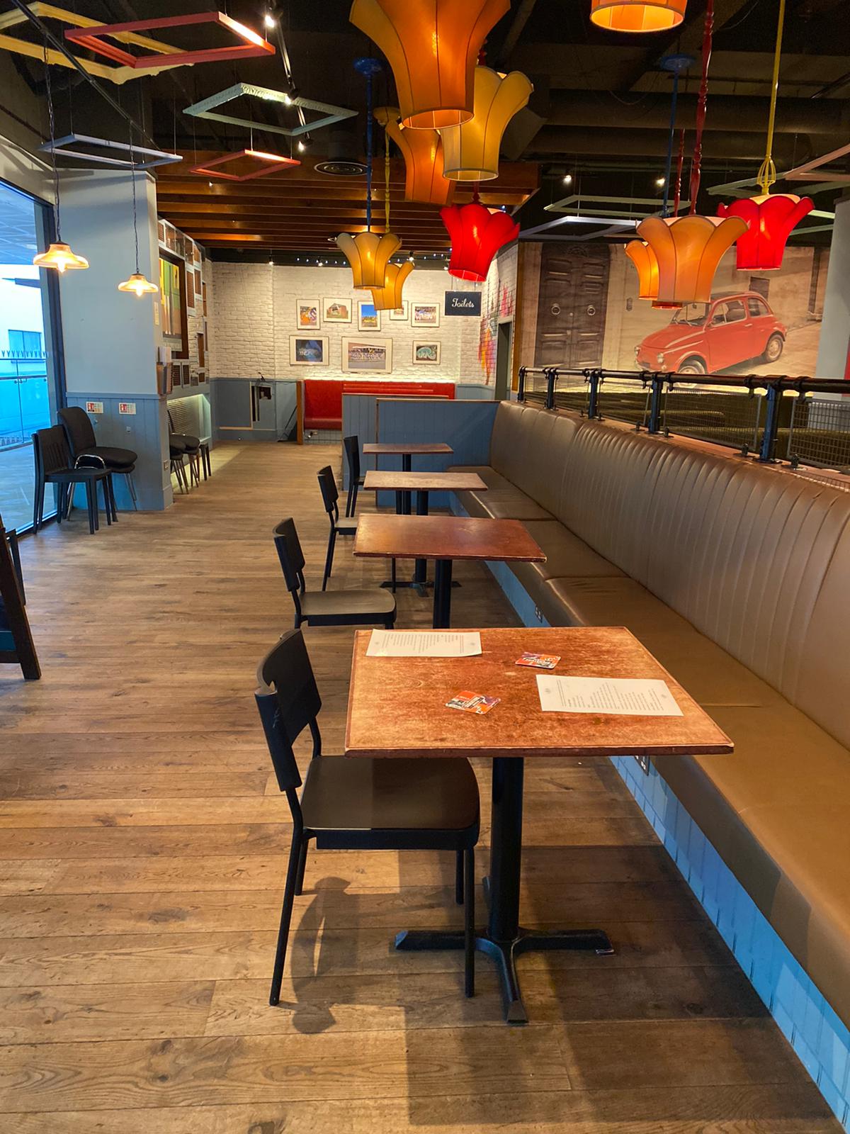 Casual dining space at LDN Craft bar, ideal for meetings and networking.