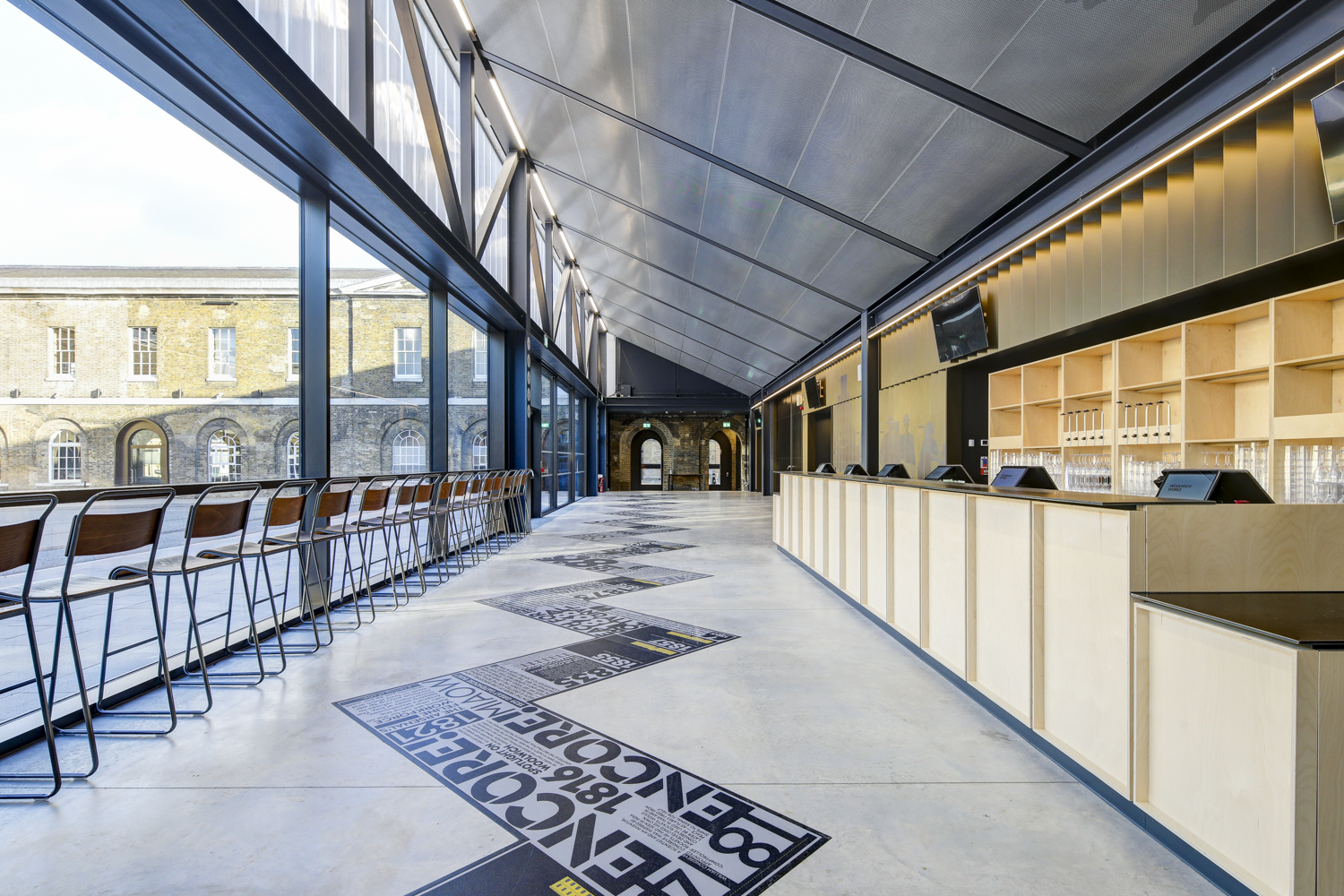 Modern Fireworks Factory venue in Woolwich Works, ideal for networking events and receptions.