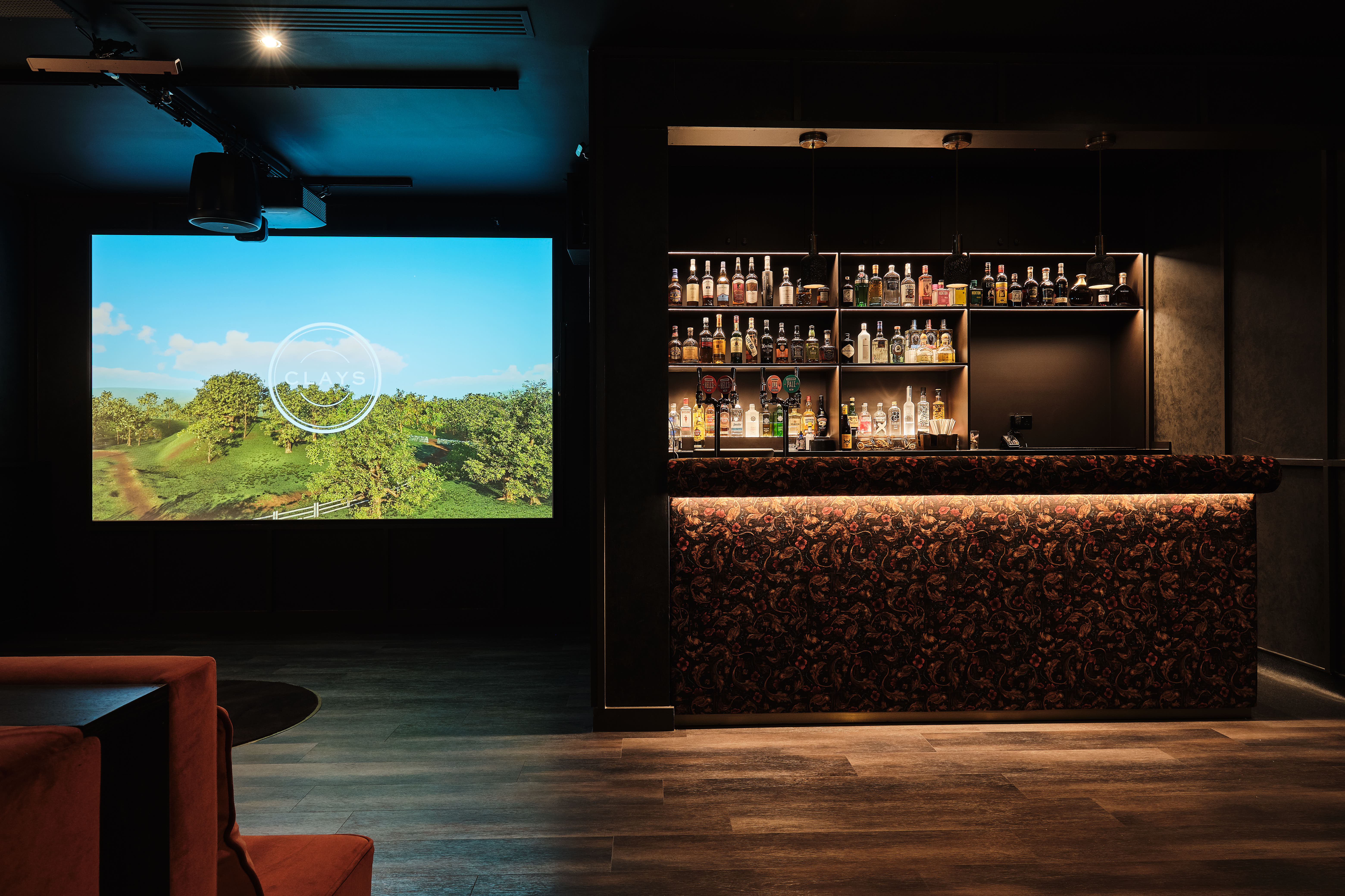 Private Shooting Room in Clays - Moorgate, modern event space with stylish bar for networking.