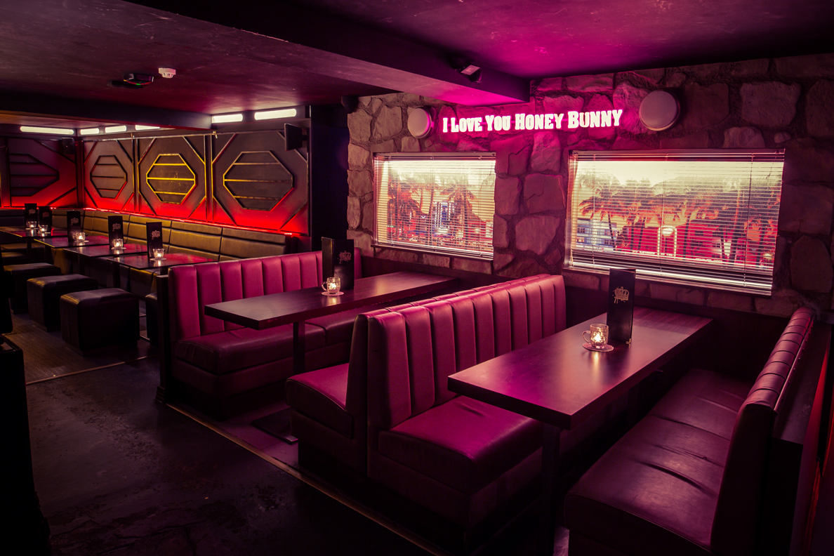 Stylish London Cocktail Club Clapham venue with cozy booths for private events.