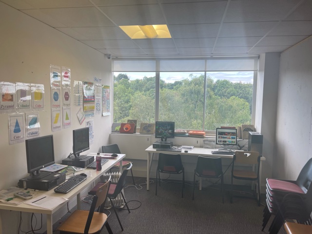 Maths Room at London Rangers FC, featuring computers and natural light for workshops.