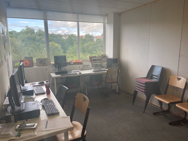 Maths Room at London Rangers FC, featuring computers and natural light for events.
