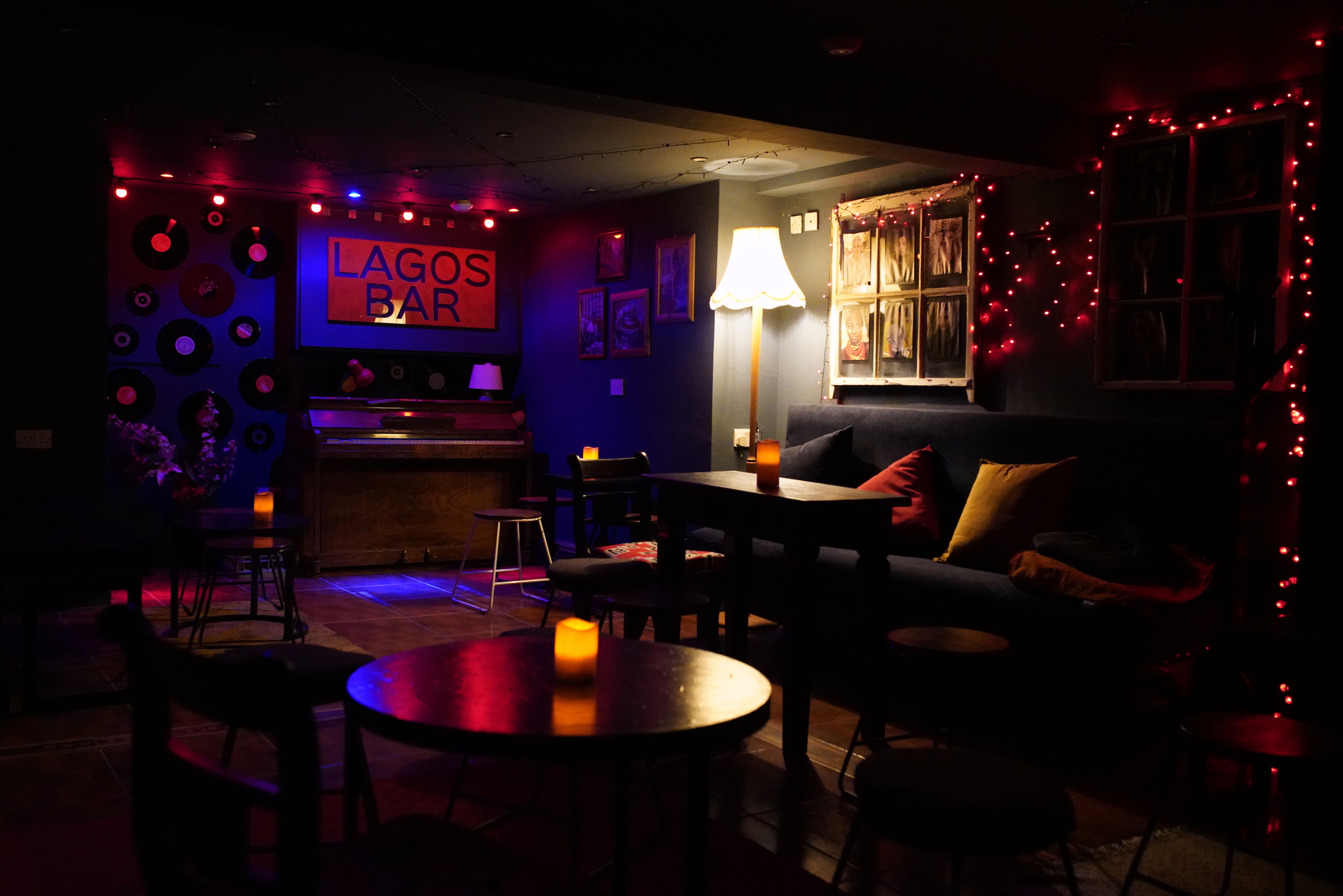 Cozy Lagos Bar venue with warm lighting, ideal for networking events and cocktail receptions.