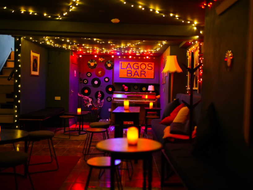 Vibrant Lagos Bar venue with warm lighting for intimate gatherings and events.