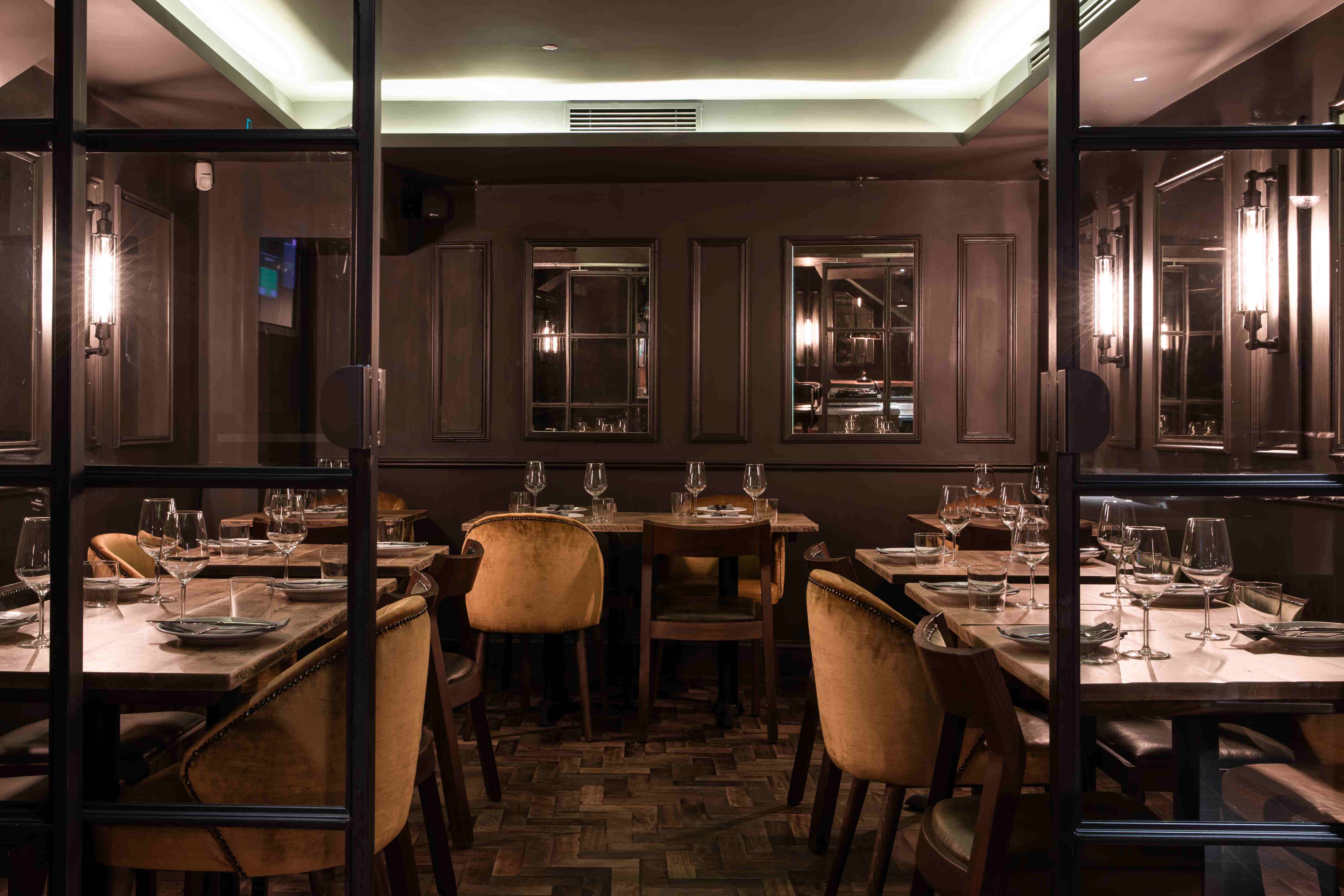 Elegant private dining room at Ember Yard, perfect for intimate gatherings and corporate events.