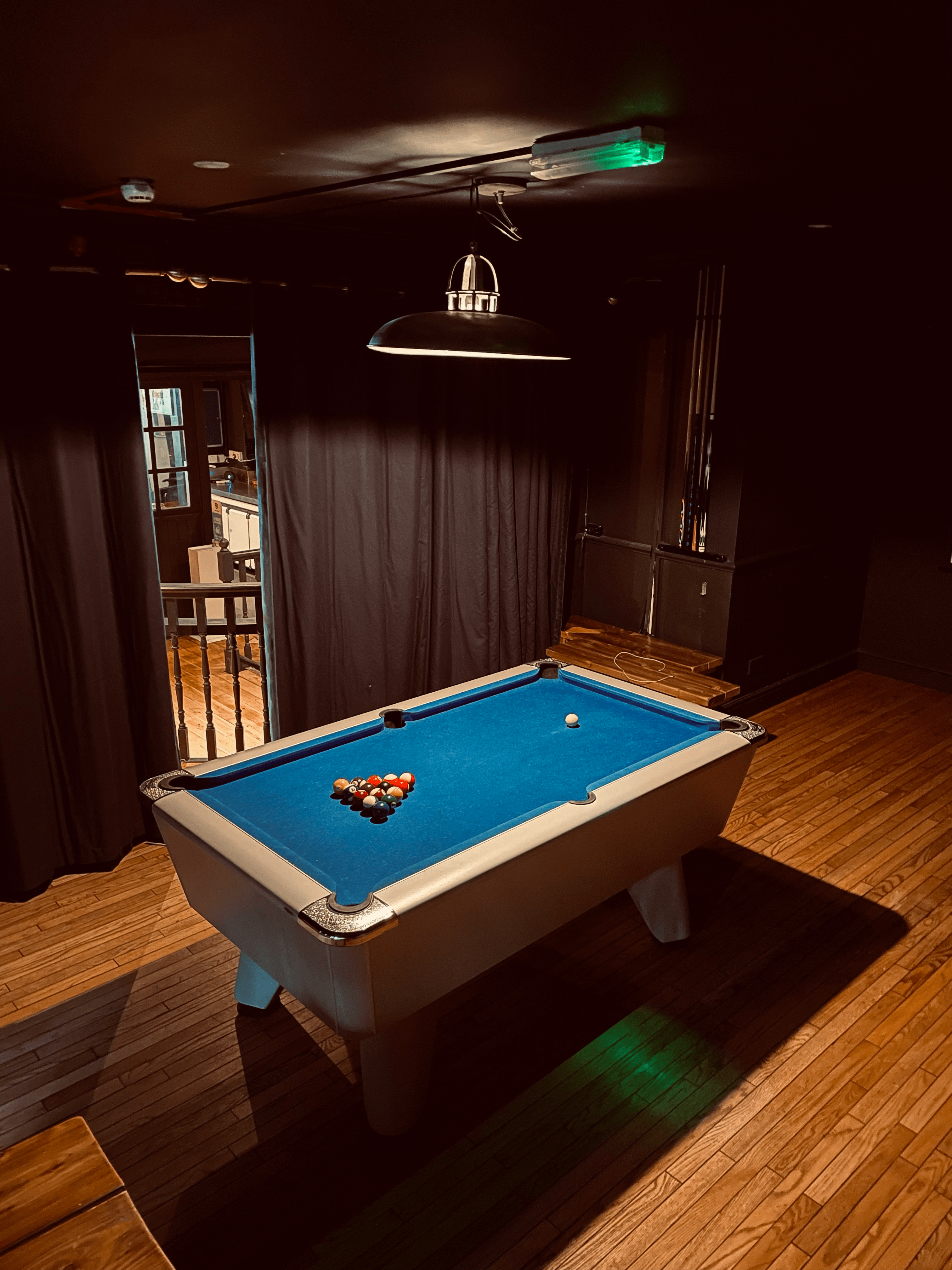 Stylish billiards table in cozy venue for networking and team-building events.