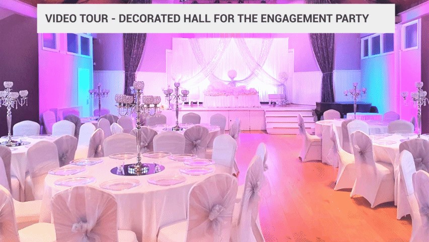 Elegant engagement party venue with pastel decor and romantic lighting.