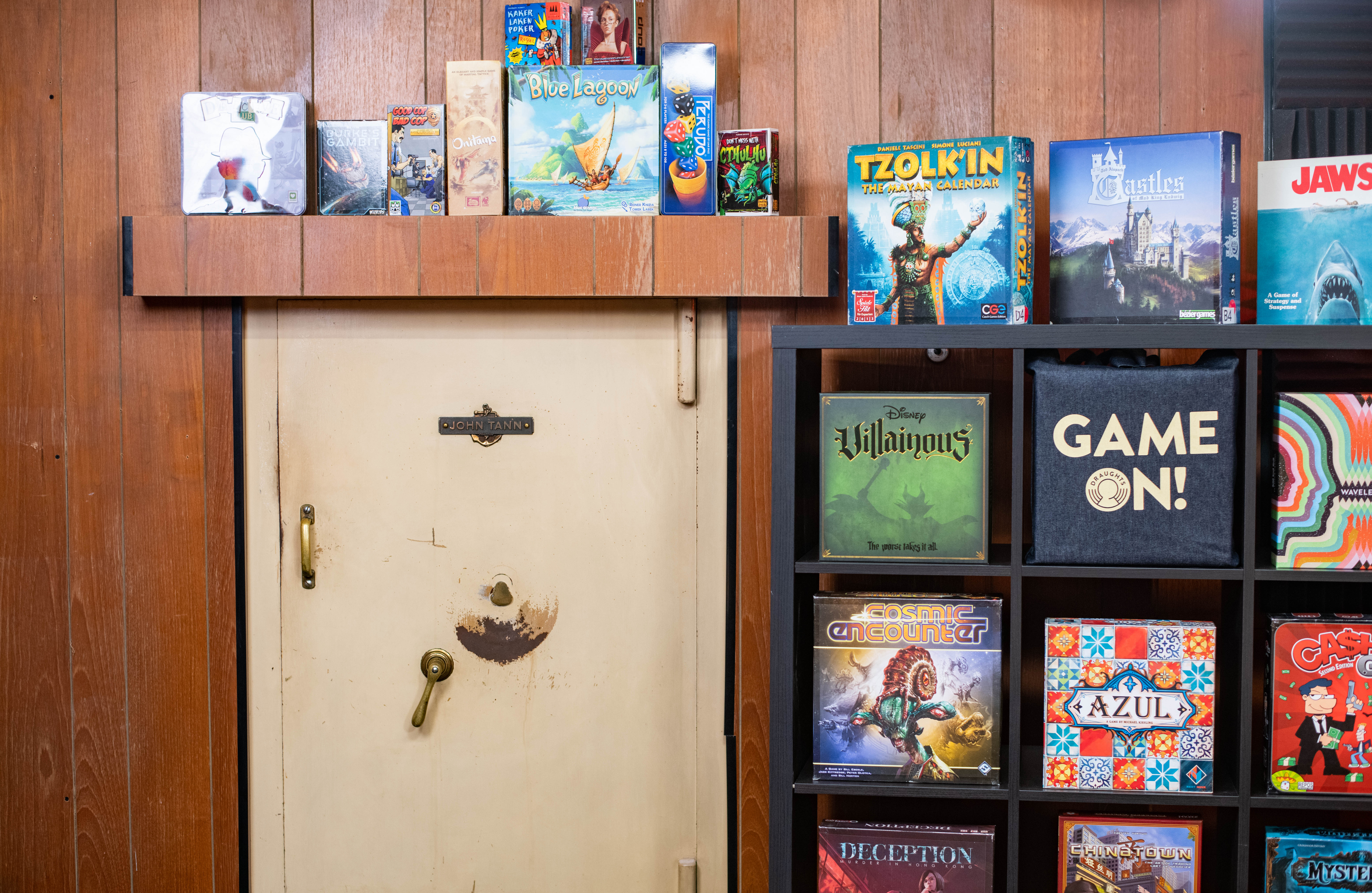 Creative event space with board games and a safe for team-building activities.