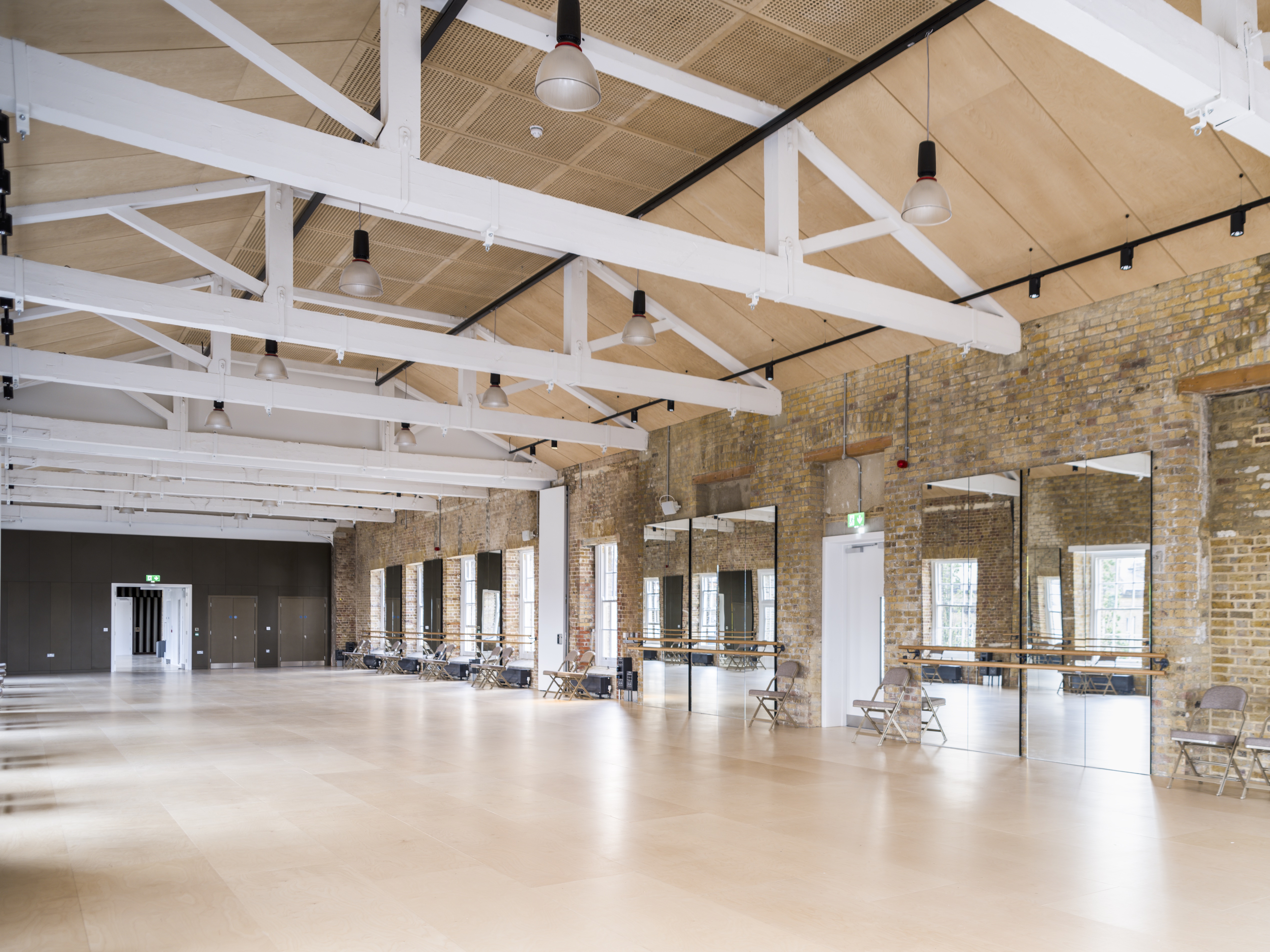 Spacious event venue with high ceilings, ideal for workshops and receptions in Woolwich.