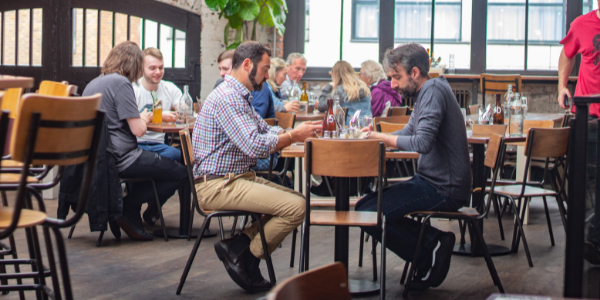 Casual dining at Mezzanine, Duke Street Market, ideal for networking and team-building events.