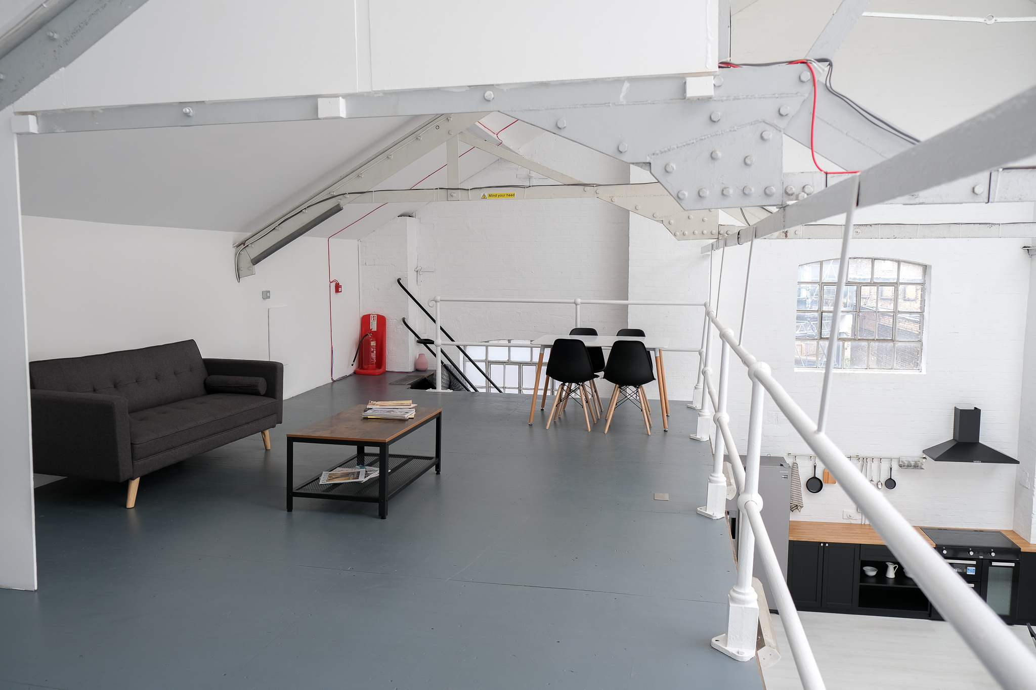 Modern meeting space at Mello Studios Hackney with natural light, ideal for creative events.