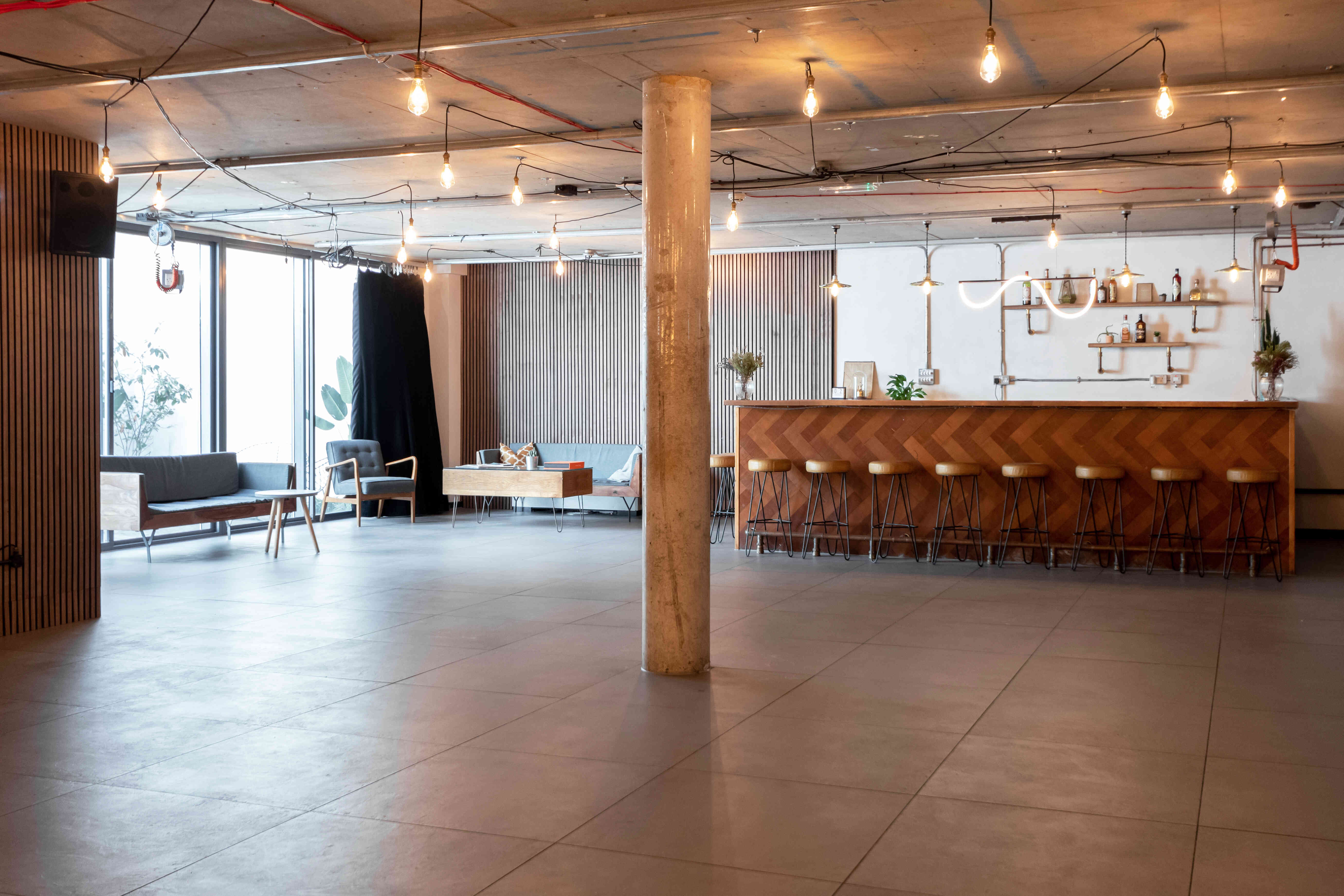 Versatile event space with modern decor, ideal for networking and receptions.