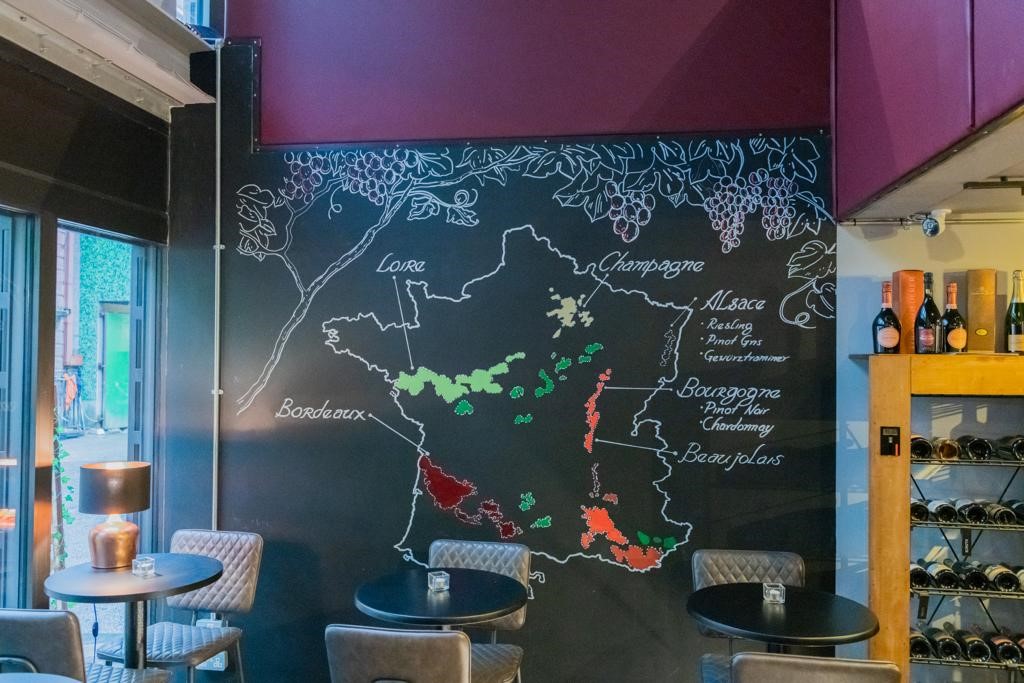 Stylish Brooks Mews Wine House venue with French wine map for wine-tasting events.