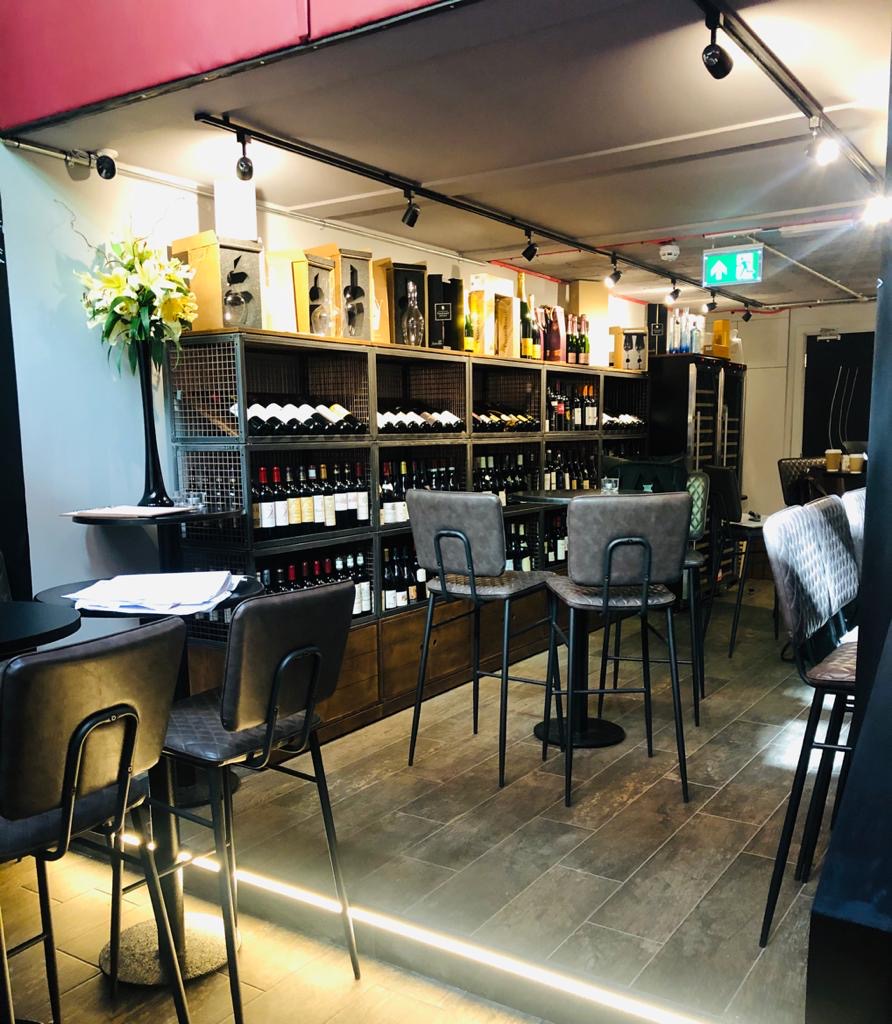Stylish wine bar venue with elegant decor for tastings and corporate events.