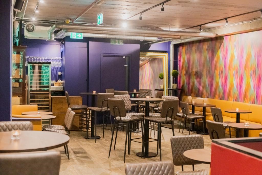 Versatile event space at Brooks Mews Wine House with modern decor for networking events.