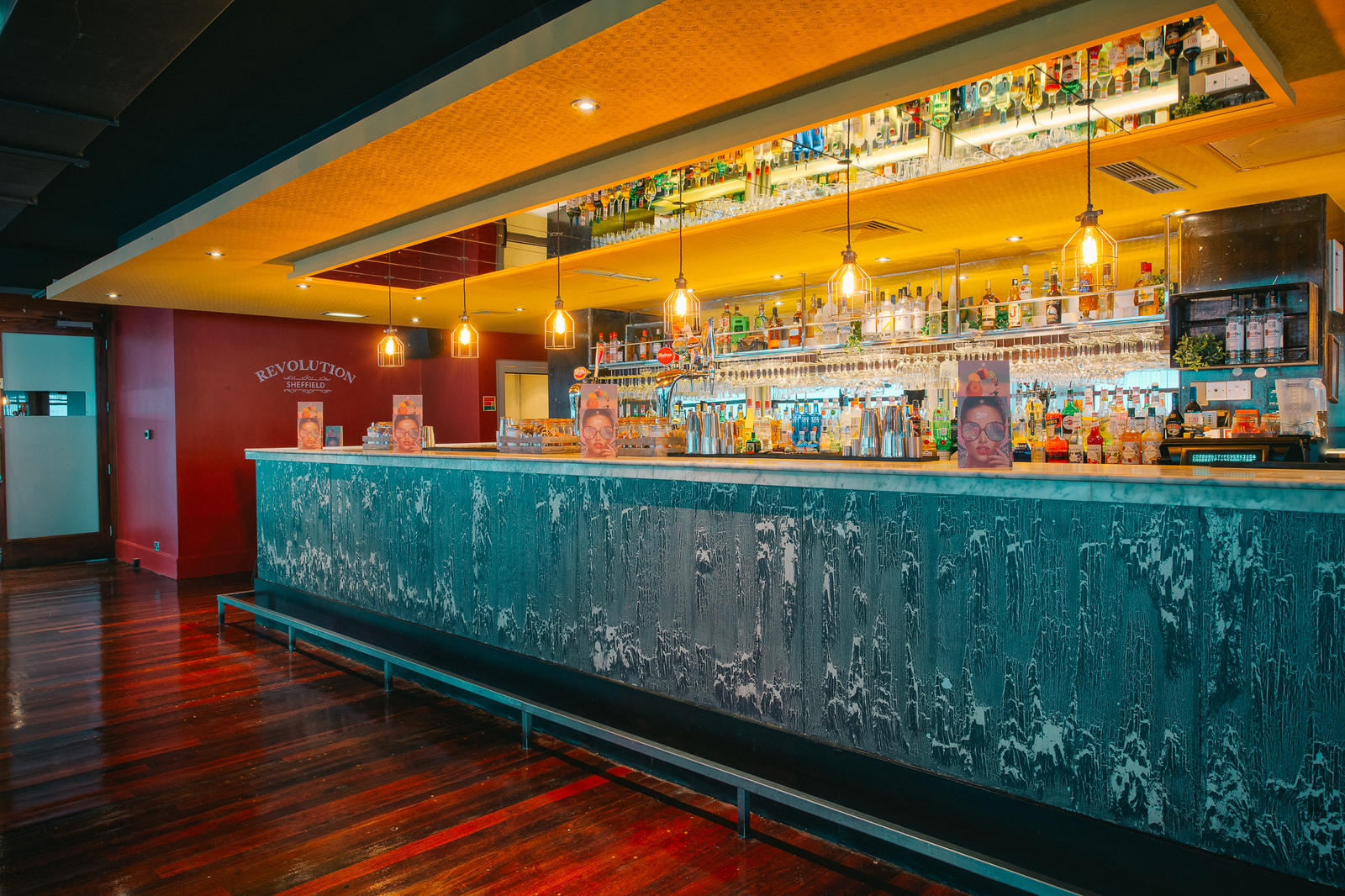 Revolution Sheffield Sky Bar with textured lighting, ideal for networking and private events.
